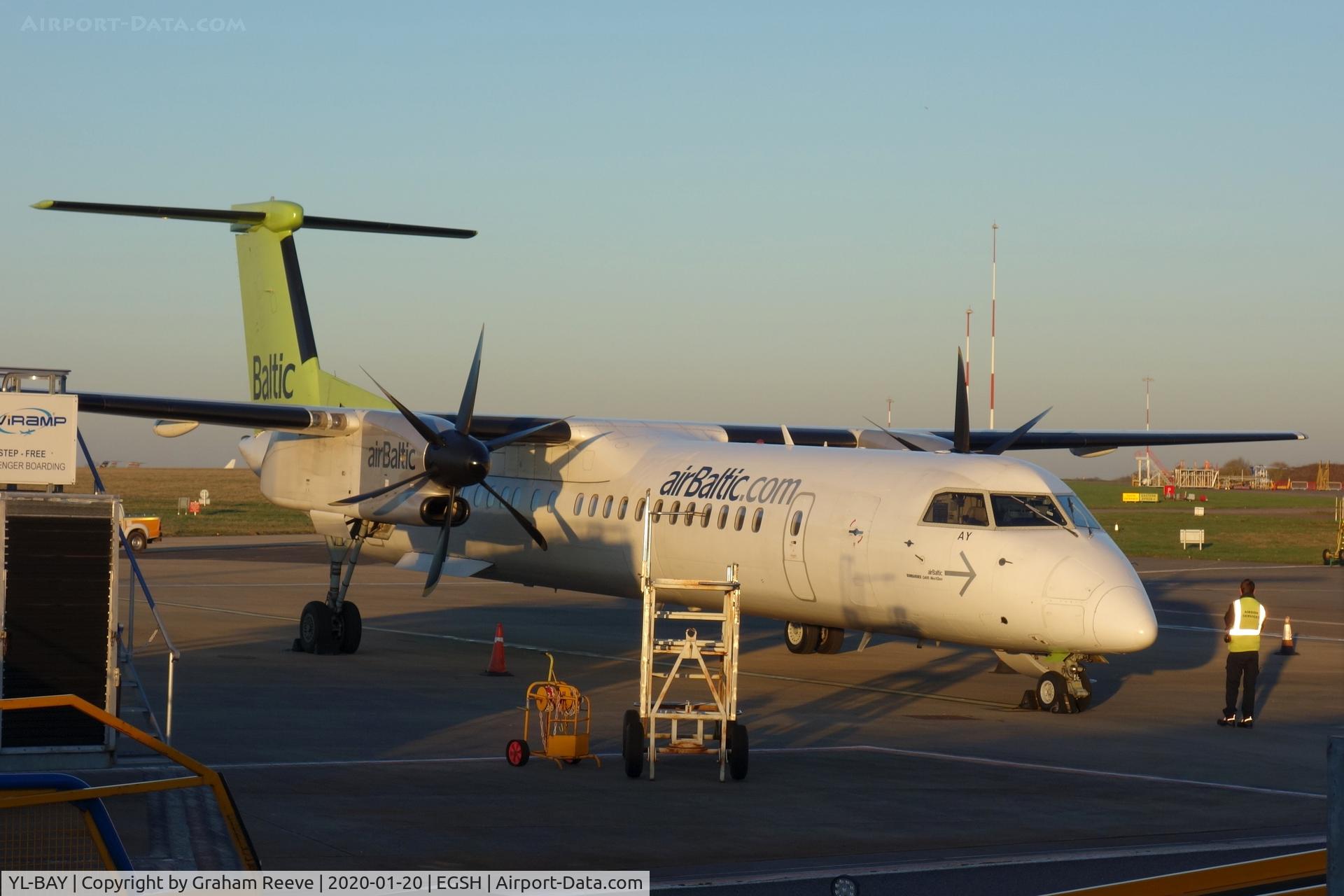 YL-BAY, 2010 De Havilland Canada DHC-8-402Q Dash 8 C/N 4331, Parked on stand at Norwich.