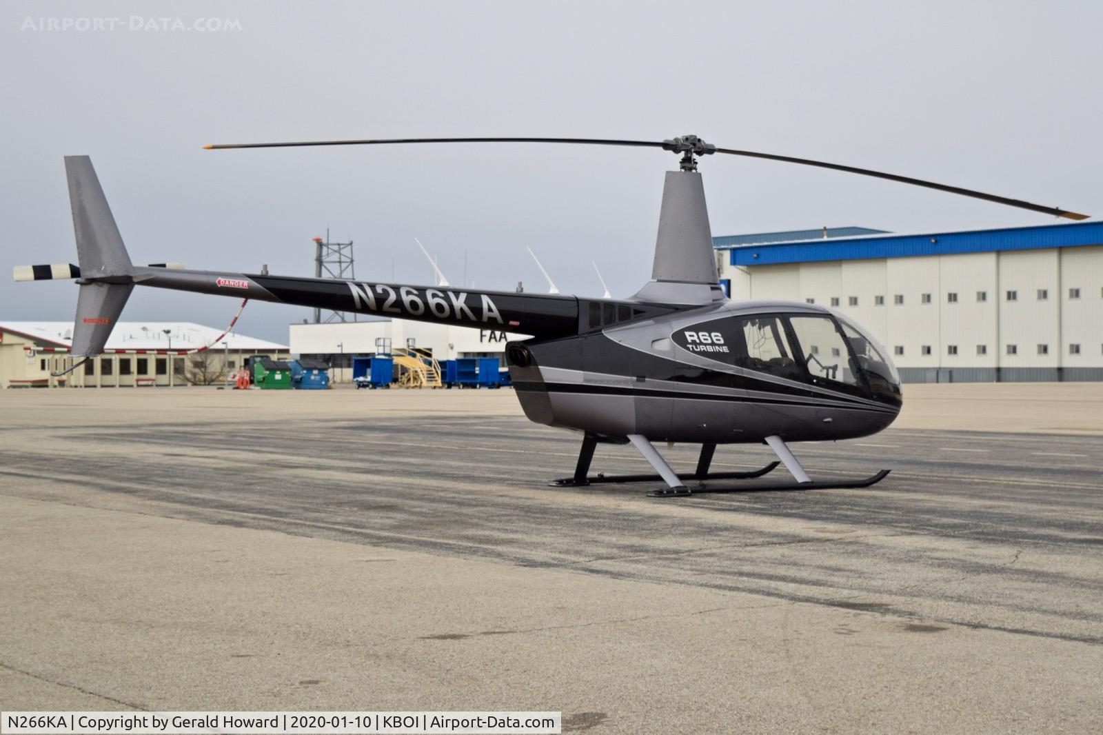 N266KA, 2014 Robinson R66 C/N 0479, Parked on north GA ramp.