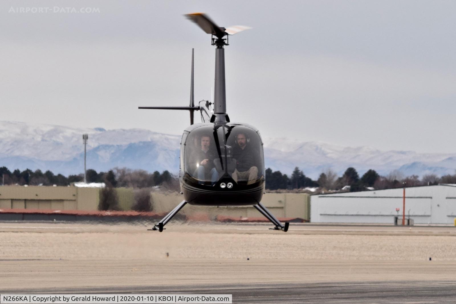 N266KA, 2014 Robinson R66 C/N 0479, Hovering.