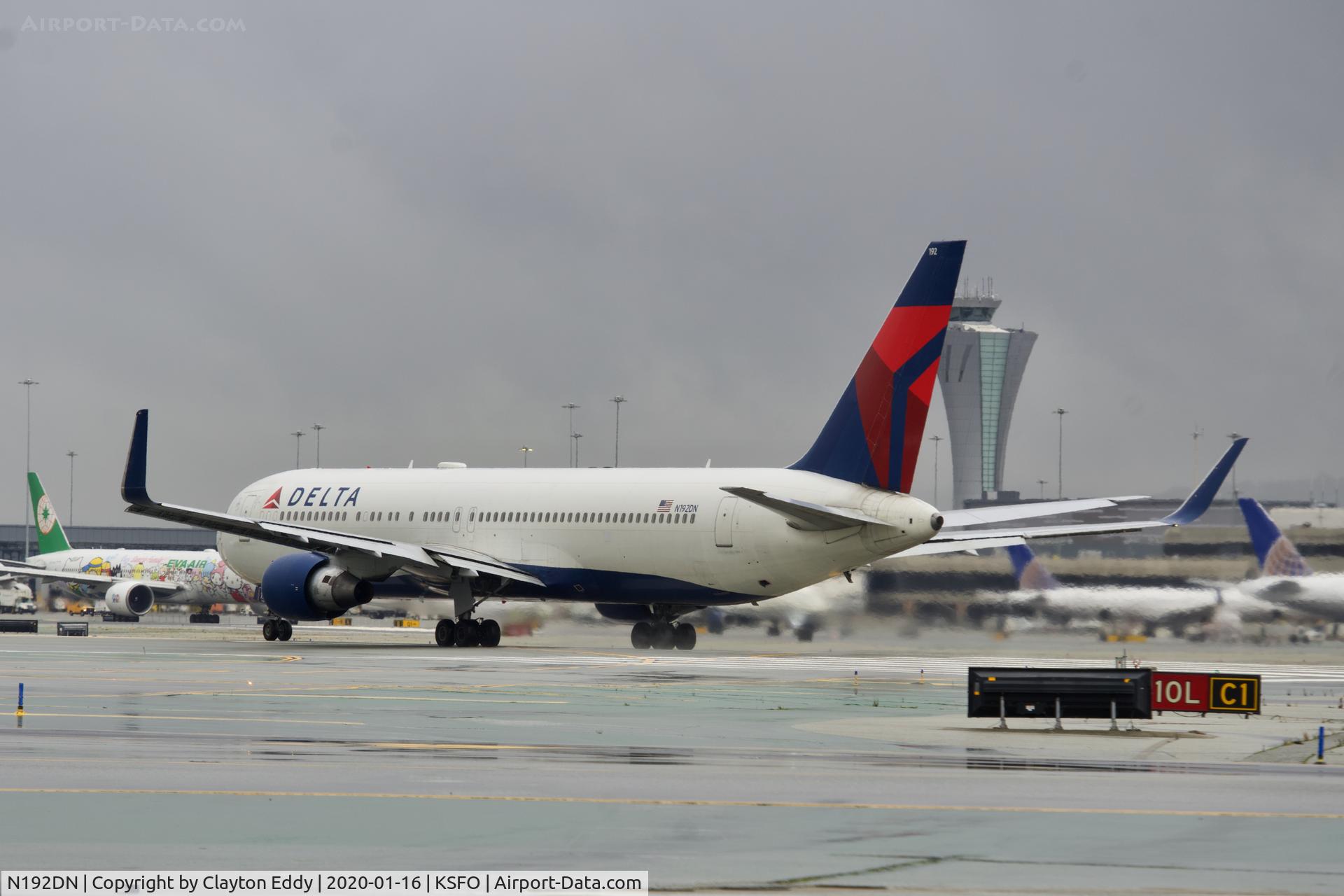 N192DN, 1997 Boeing 767-332 C/N 28449, departing runway 10 SFO 2020.