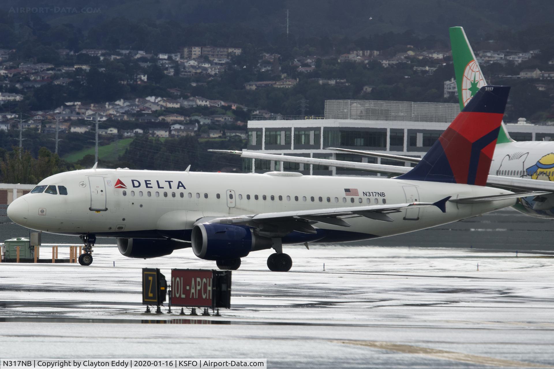 N317NB, 2000 Airbus A319-114 C/N 1324, Departing runway 10 SFO 2020.