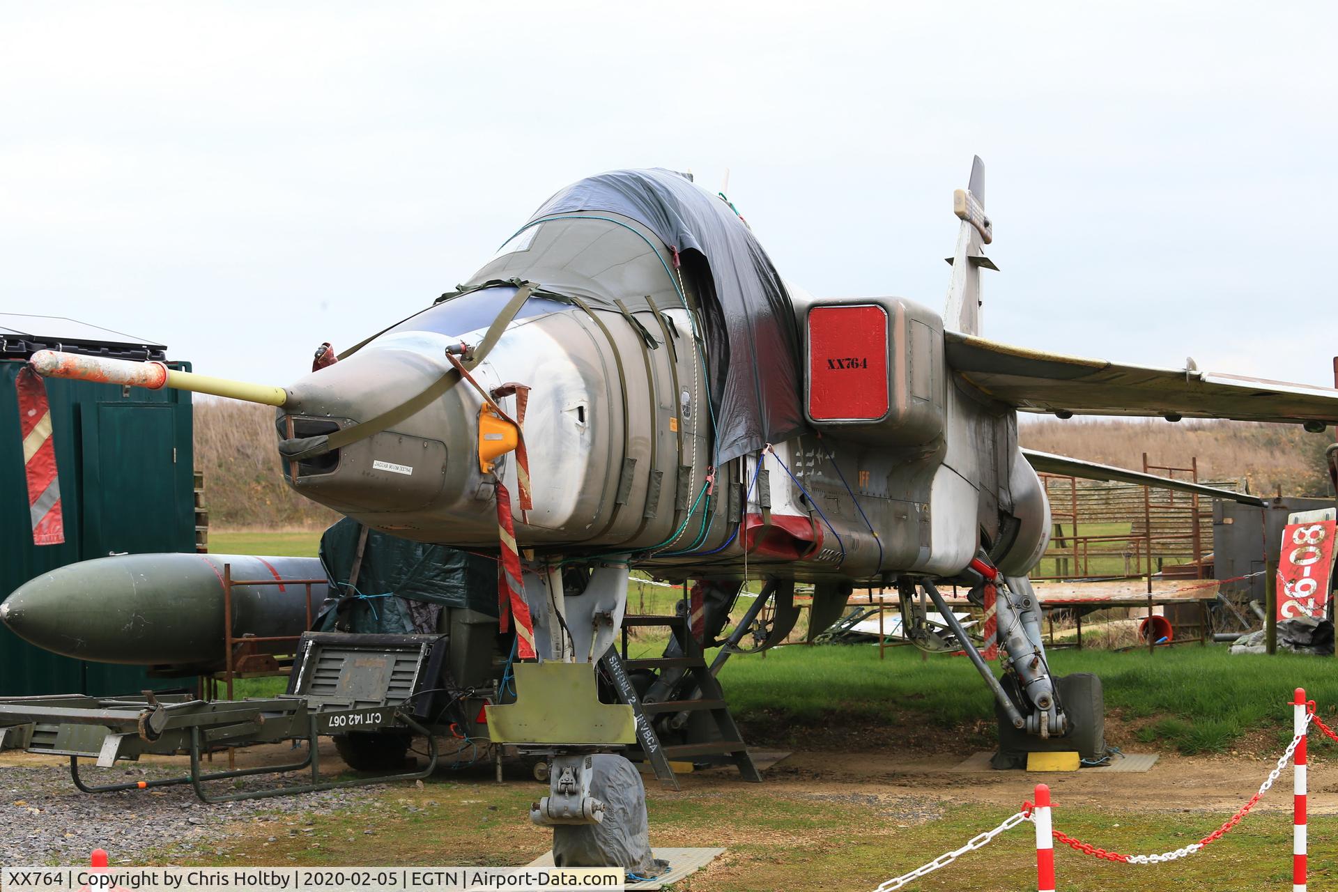 XX764, 1975 Sepecat Jaguar GR.1 C/N S.61, Securely parked on show at Enstone but slowly weathering away...