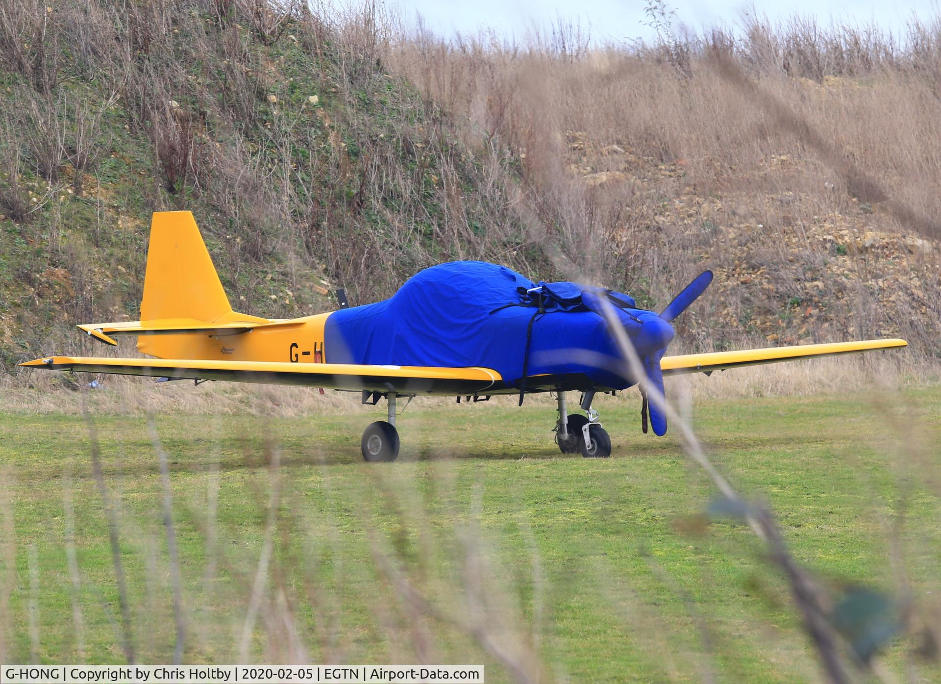G-HONG, 1988 Slingsby T-67M-200 Firefly C/N 2060, Parked and covered at Enstone