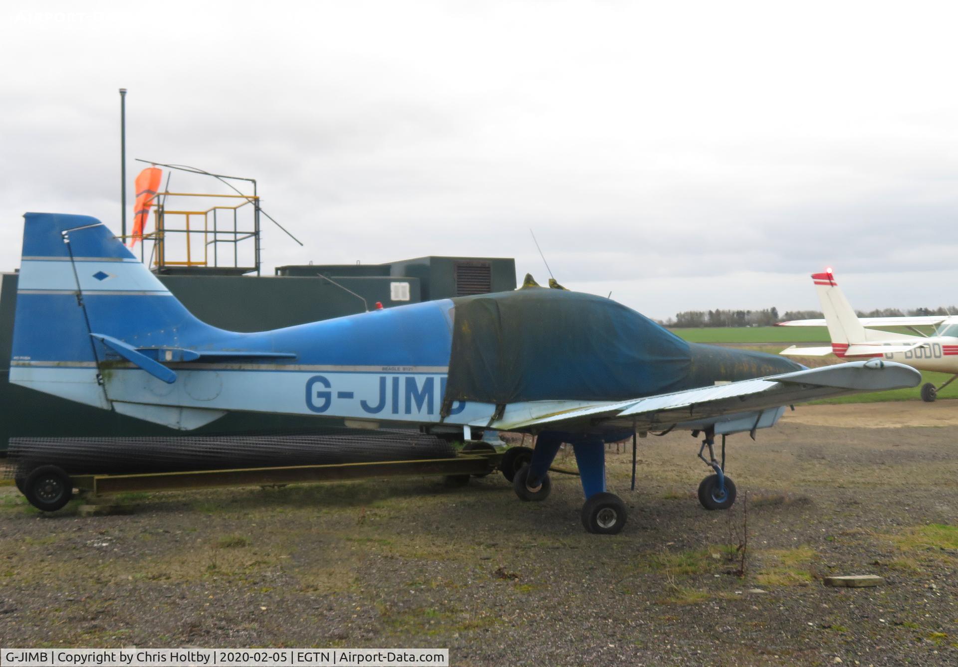 G-JIMB, 1969 Beagle B-121 Pup Series 1 (Pup 100) C/N B121-033, Still at Enstone owned by the Flying Club. Covered up but looking distinctly weather beaten...