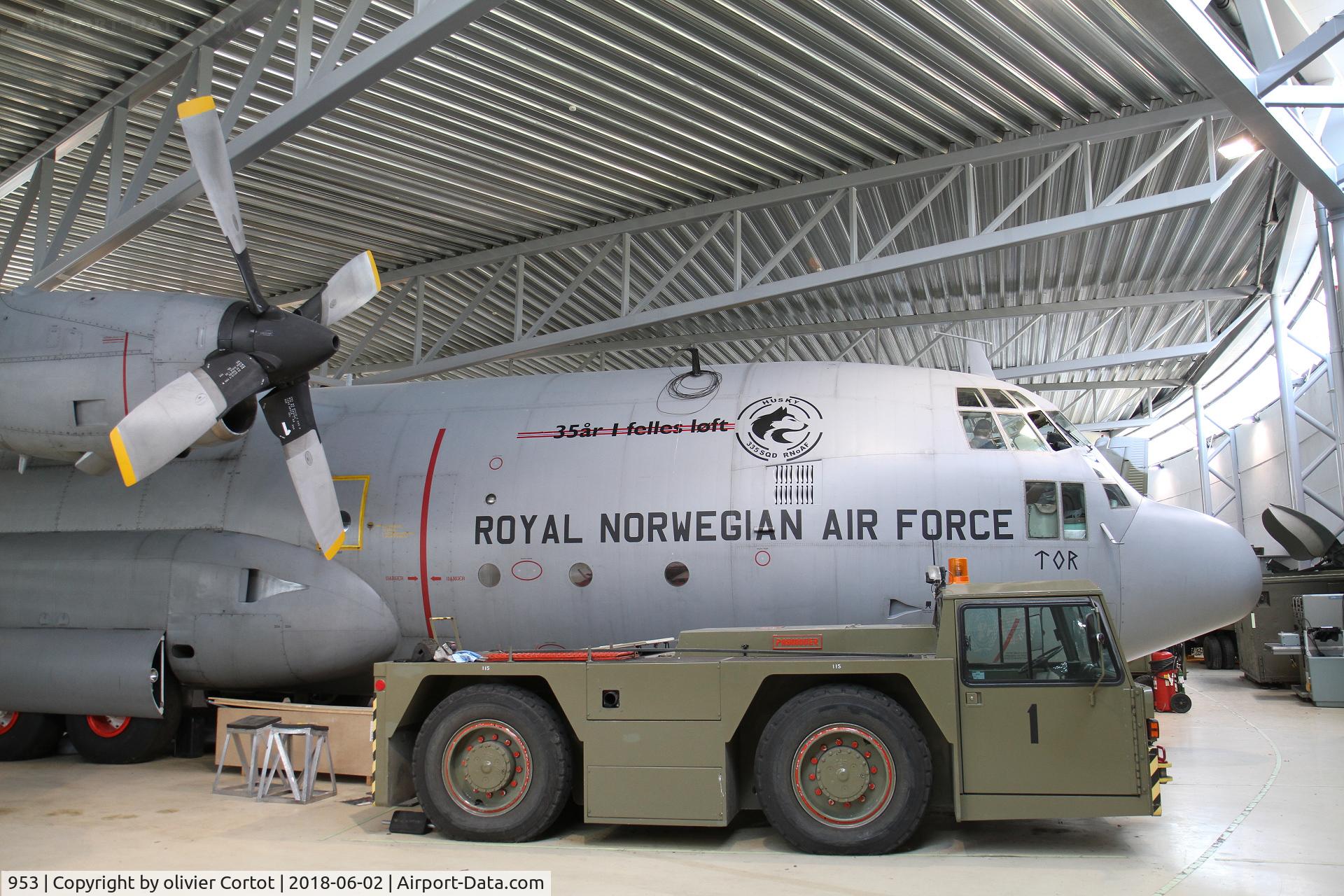 953, 1968 Lockheed C-130H Hercules C/N 382-4335, the C-130 and a tug truck