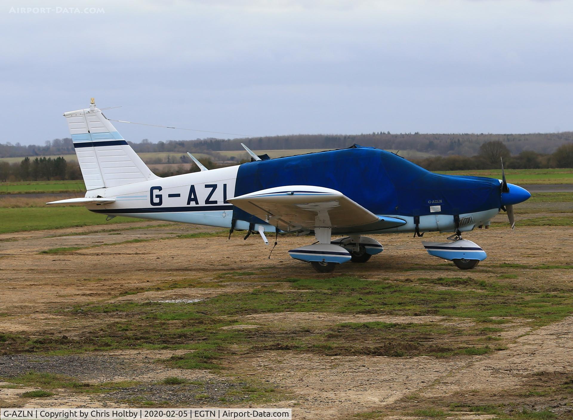 G-AZLN, 1971 Piper PA-28-180 Cherokee C/N 28-7105210, Parked and covered at Enstone, Oxon