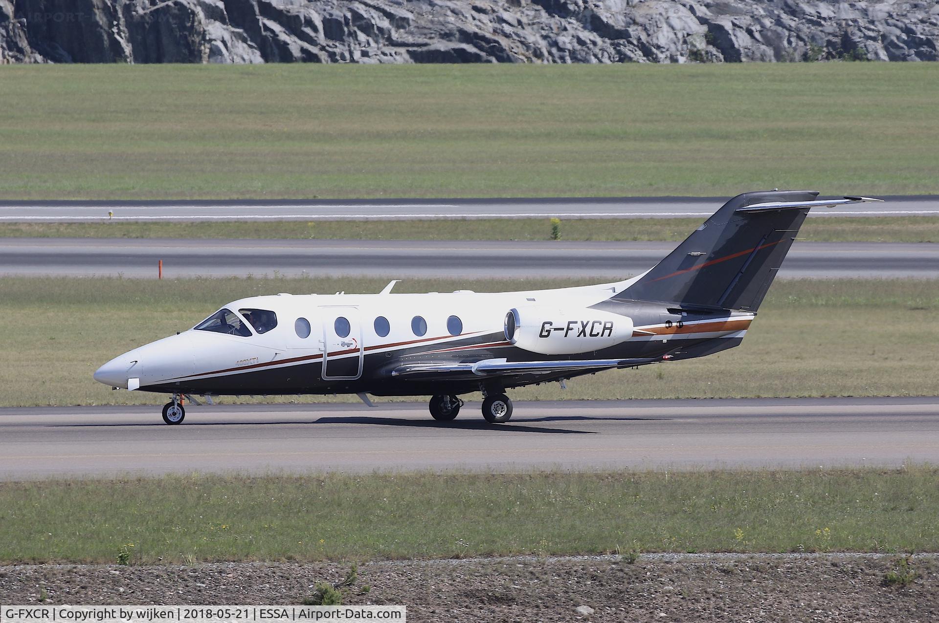 G-FXCR, 2005 Raytheon Beechjet 400A/Nextant N400XT C/N RK-423, Taxiway W