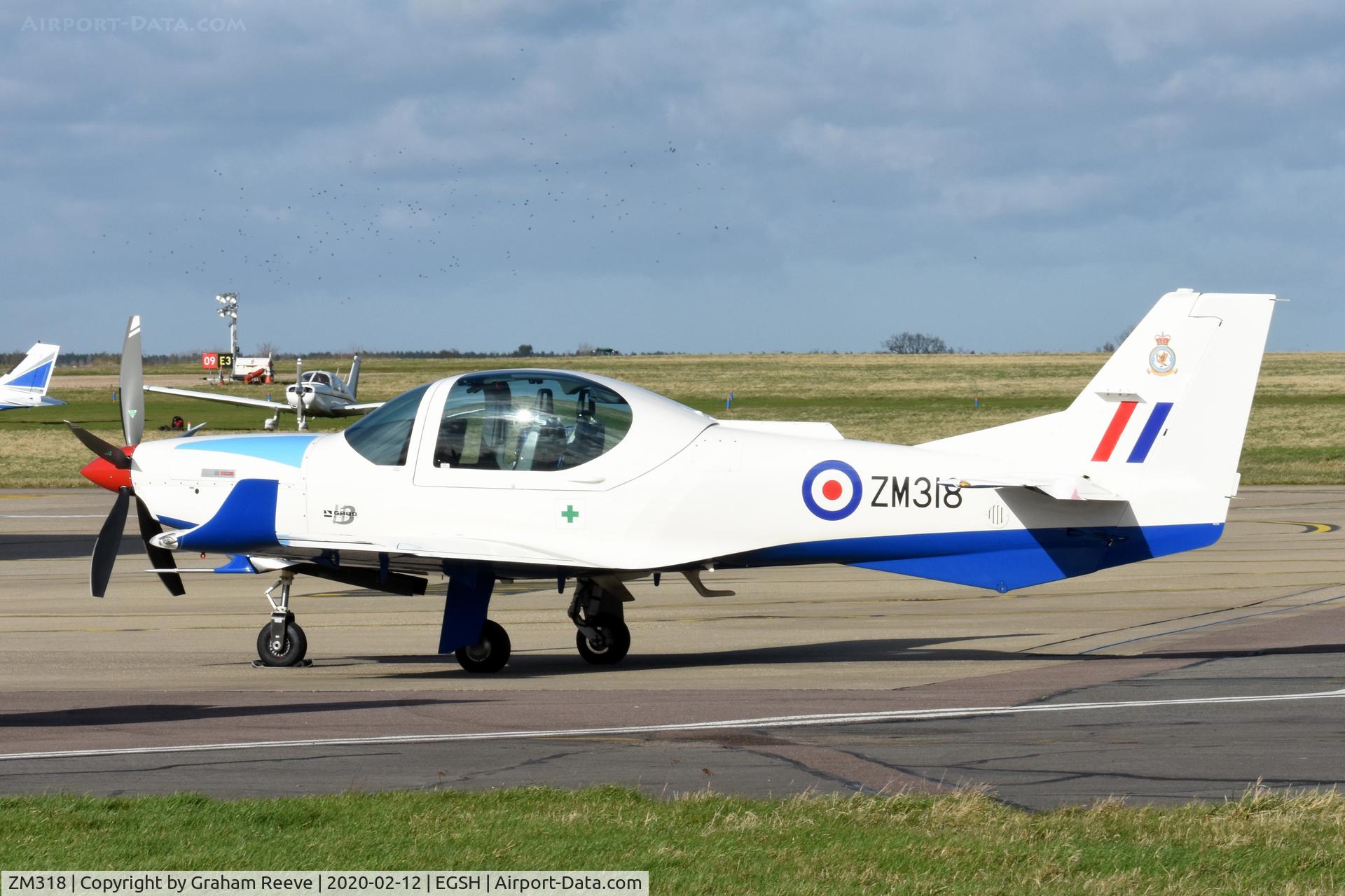 ZM318, 2017 Grob G-120TP-A Prefect T.1 C/N 11143, Parked at Norwich.