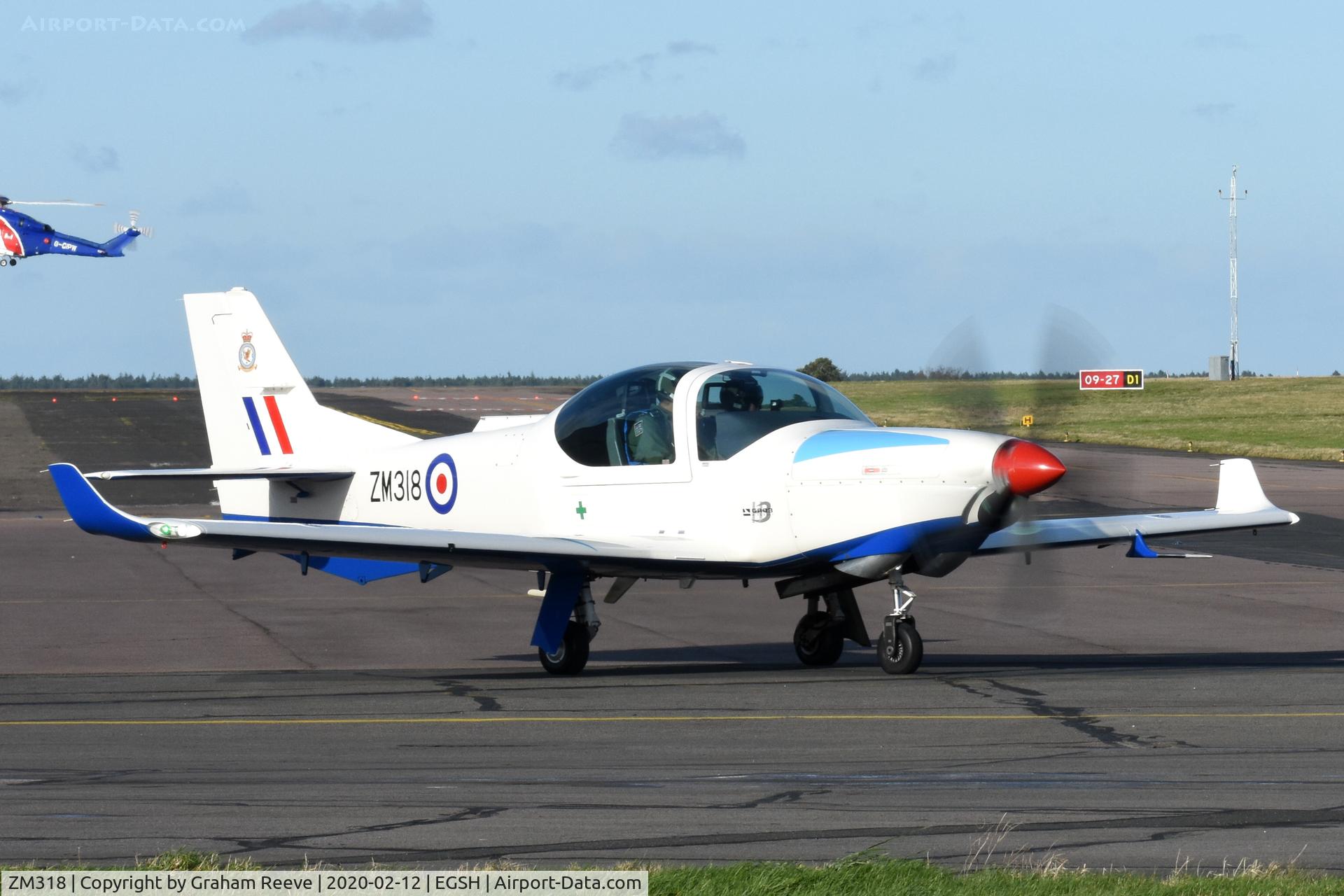 ZM318, 2017 Grob G-120TP-A Prefect T.1 C/N 11143, Departing from Norwich.