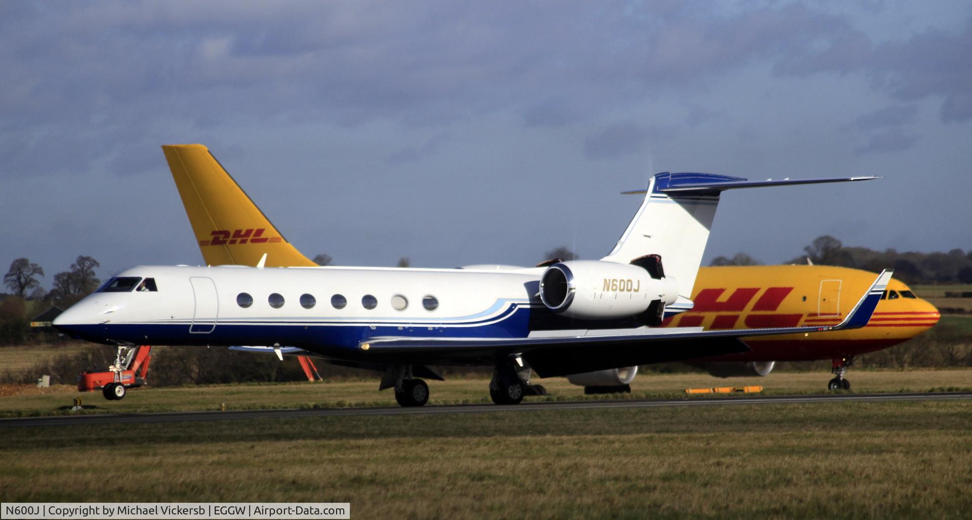 N600J, 2006 Gulfstream Aerospace GV-SP (G550) C/N 5138, just landing runway 26