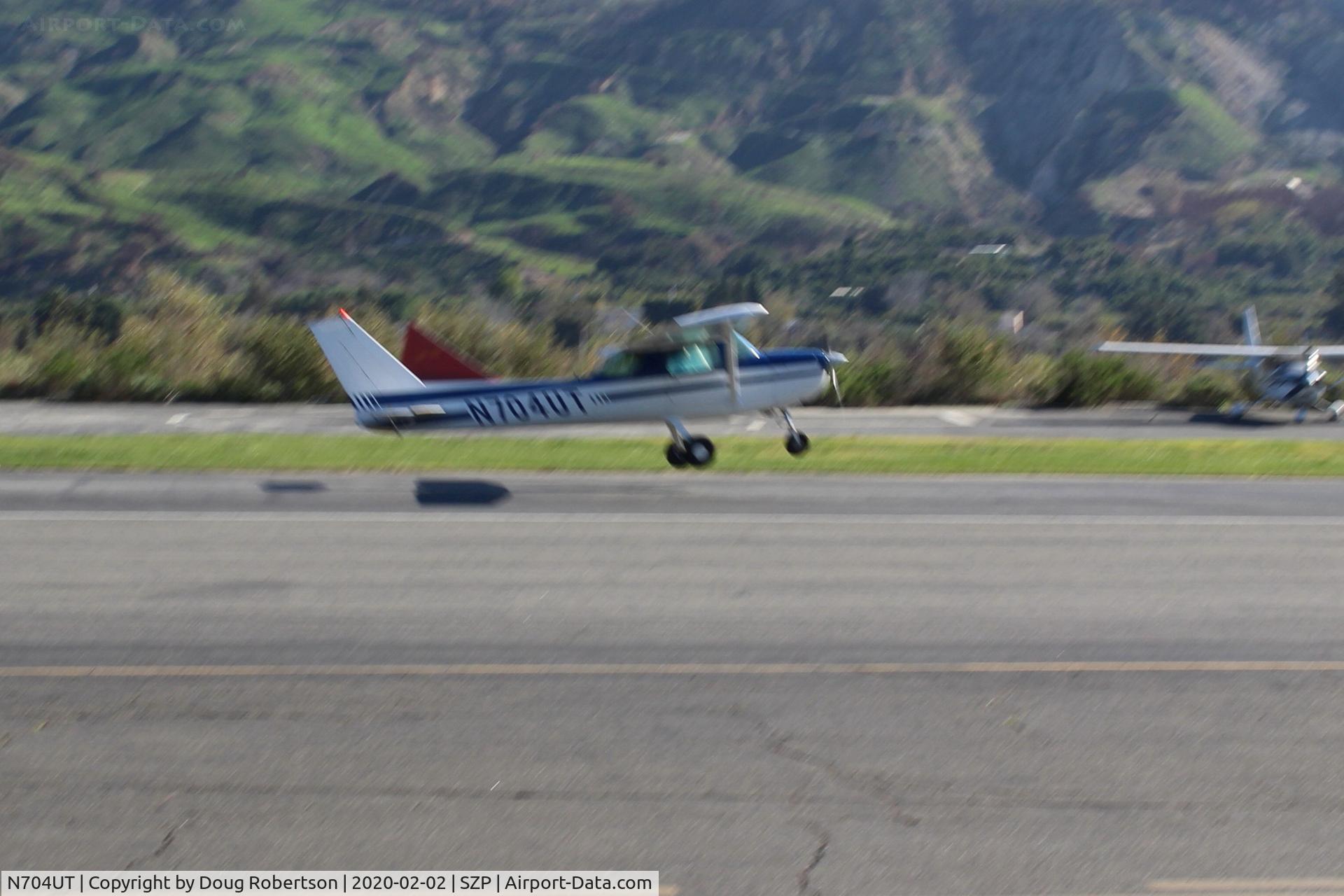 N704UT, 1976 Cessna 150M C/N 15078891, 1976 Cessna 150M, Continental O-200 100 Hp, takeoff climb Rwy 22