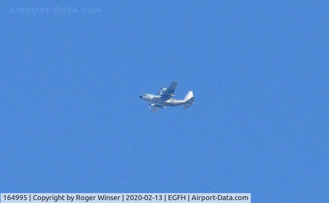 164995, Lockheed C-130T Hercules C/N 382-5300, US Navy C-130T aircraft operated by VR-53 seen flying at 15000 feet to the North of the airport.