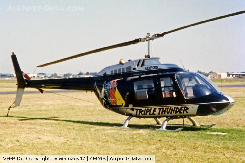 VH-BJG, 1978 Bell 206B (III) C/N 2345, Jayrow Helicopters Bell 206A JetRanger VH-BJG Cn 2345 at Moorabbin YMMB Victoria in late Dec 1980. The B206A (on low skid gear) has a Logo on the cabin promoting Melbourne’s Radio Station ‘Triple Thunder FM105’ (Later on frequency FM 92). Low res photo.