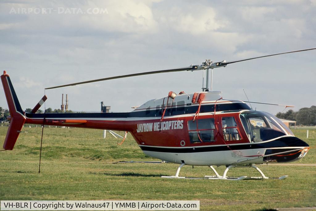 VH-BLR, 1974 Bell 206B JetRanger II C/N 1309, Stbd side view of Jayrow Helicopters Bell 206B JetRanger II VH-BLR Cn 1309 (in red-white-black livery) at Moorabbin YMMB  Victoria in 1976.
