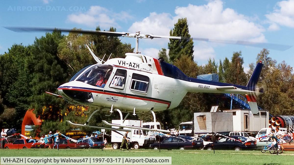 VH-AZH, 1980 Bell 206B (III) C/N 3075, Port side view of Heli-Aust Bell 206B JetRanger III VH-AZH Cn 3075 hovering near Lake Burley Griffin and Old Parliament House Canberra during Canberra Week festivities on 17Mar1997-Canberra Day. Several Bell JetRangers flew many 5 min Joyflights that day.