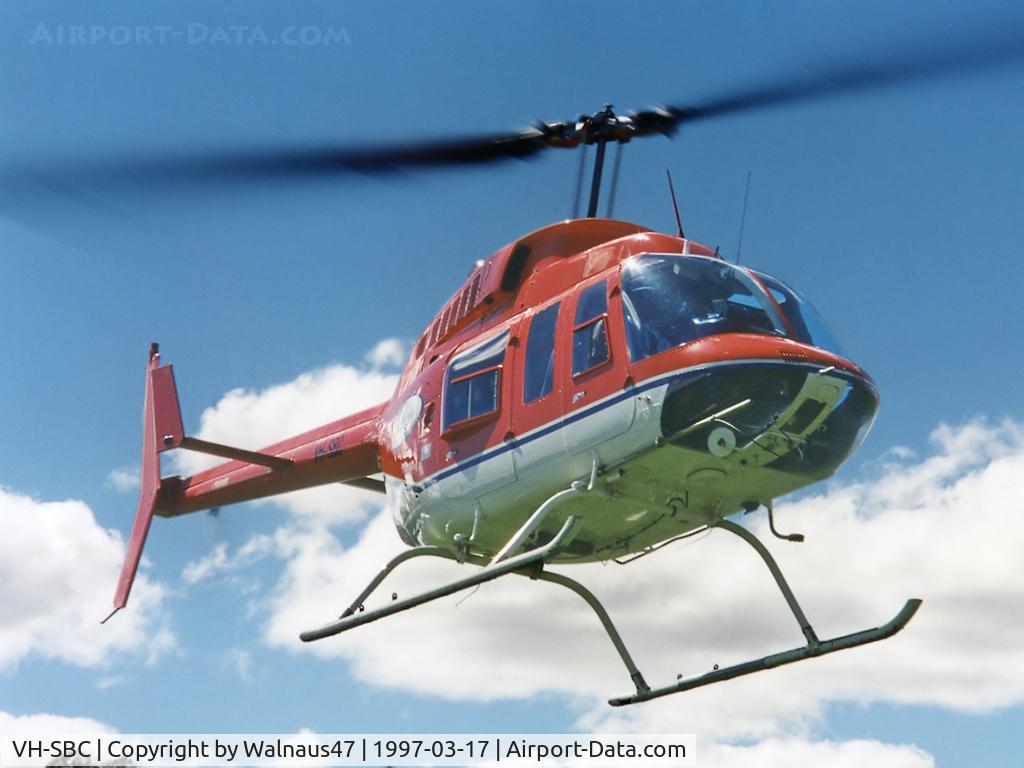 VH-SBC, 1973 Bell 206L-3 LongRanger III LongRanger III C/N 51396, Front Stbd side view of Bell 206L-3 LongRanger III VH-SBC Cn 51396 descending close to Lake Burley Griffin Canberra during Canberra Week festivities on 17Mar1997 (Canberra Day). Several Bell JetRangers flew numerous 5 min Joyflights during that day.