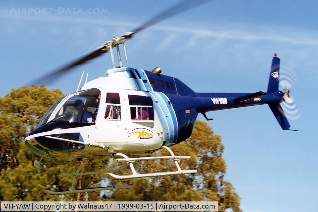 VH-YAW, 1973 Bell 206B Jetranger II C/N 942, Low Res close-cropped front Port side view of Virgin Helicopters ACT Bell 206B JetRanger VH-YAW Cn 942 departing close to Lake Burley Griffin Canberra during Canberra Week festivities on 15Mar1999 (Canberra Day).