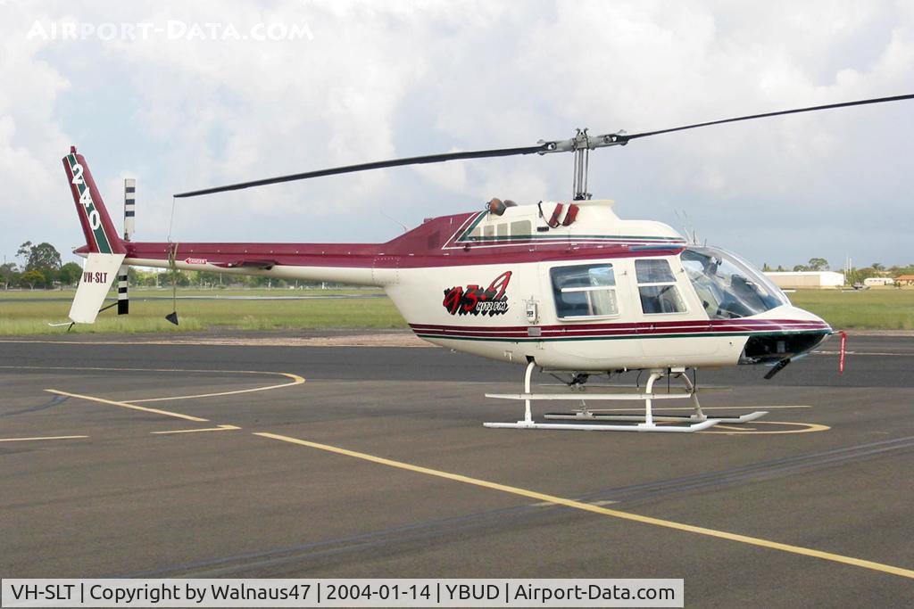 VH-SLT, 1980 Bell 206B (III) C/N 3072, Stbd side view of Bell 206B-3 JetRanger III VH-SLT Cn 3072 Code 240 at Bundaberg Airport YBUD on 14Jan2004. The helo wore a ‘93.9 Hitz FM’ Logo for a sponsoring Queensland Radio Station, and Code ‘Firebird 240’.