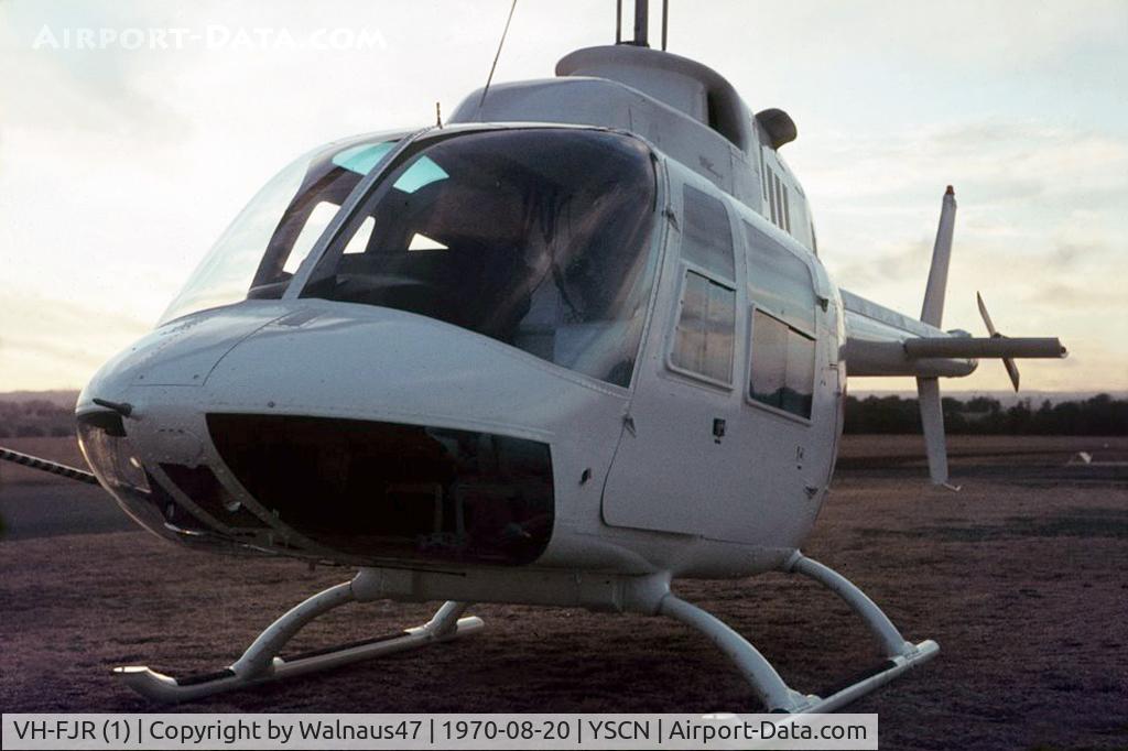 VH-FJR (1), 1970 Bell 206A JetRanger JetRanger C/N 168, Close cropped view of the cabin of Bell Helicopter Australia (BHA) white-skin Demonstrator Bell 206A JetRanger VH-FJR Cn 168. Photo taken just before sunset at Camden Airport, YSCN, on 20Aug1970. The helo was fitted with a Nite-Sun searchlight.