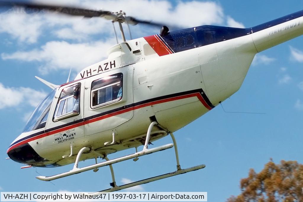 VH-AZH, 1980 Bell 206B (III) C/N 3075, Low Res close-cropped rear Port side view of the front end of Heli-Aust Bell 206B JetRanger III VH-AZH Cn 3075 taking-off near Lake Burley Griffin and Old Parliament House Canberra during Canberra Week festivities on 17Mar1997 (Canberra Day).