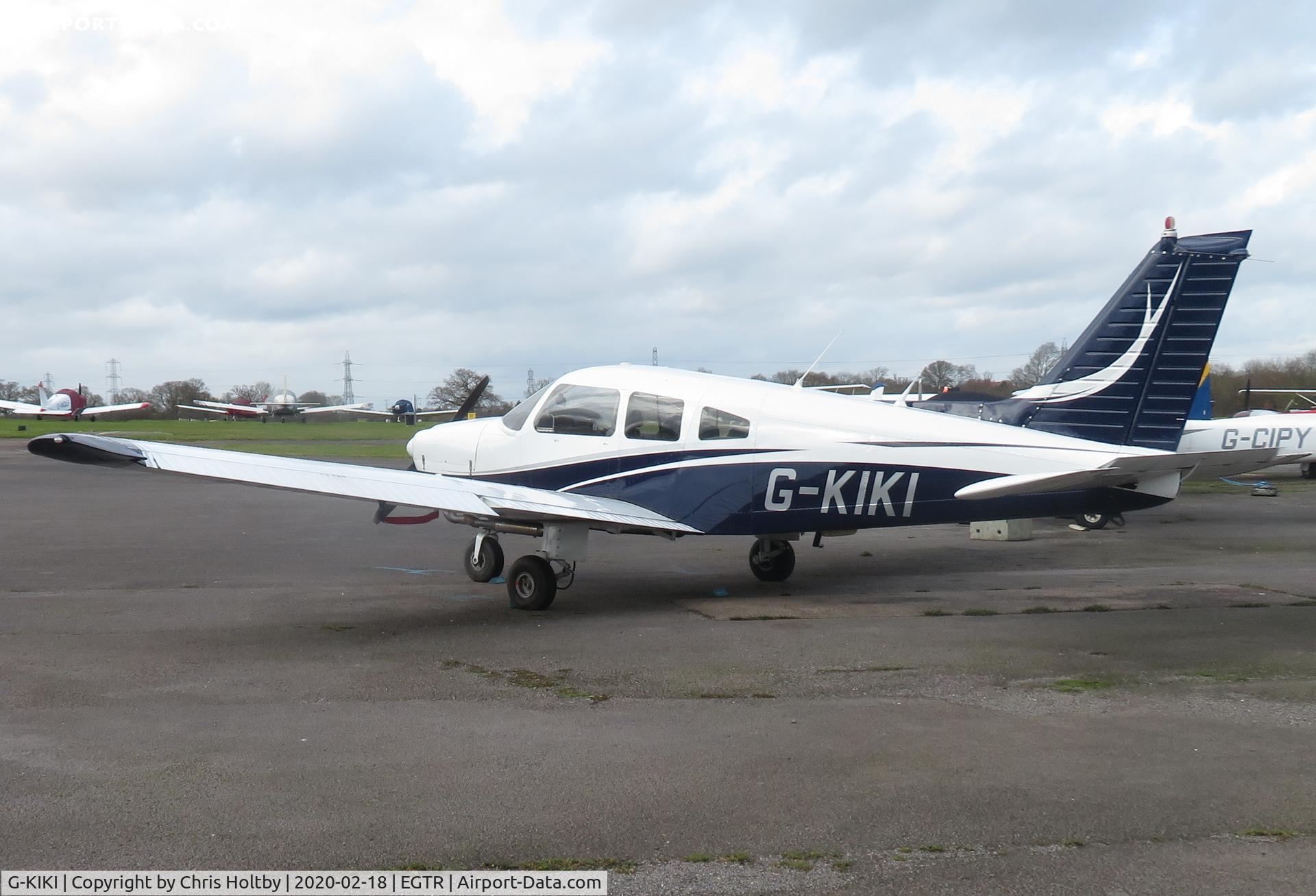 G-KIKI, 1979 Piper PA-28-181 Cherokee Archer II C/N 28-7990377, Parked outside with many other Elstree resident light aircraft