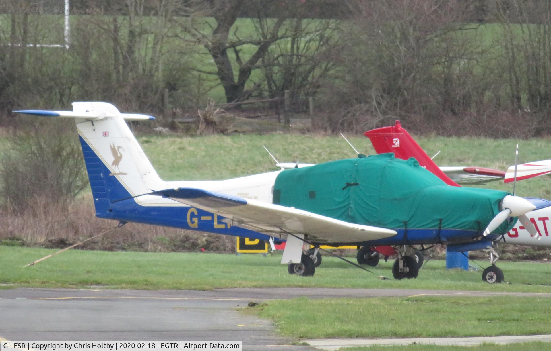 G-LFSR, 1979 Piper PA-28RT-201 Arrow IV Arrow IV C/N 28R-7918091, Parked and covered at Elstree