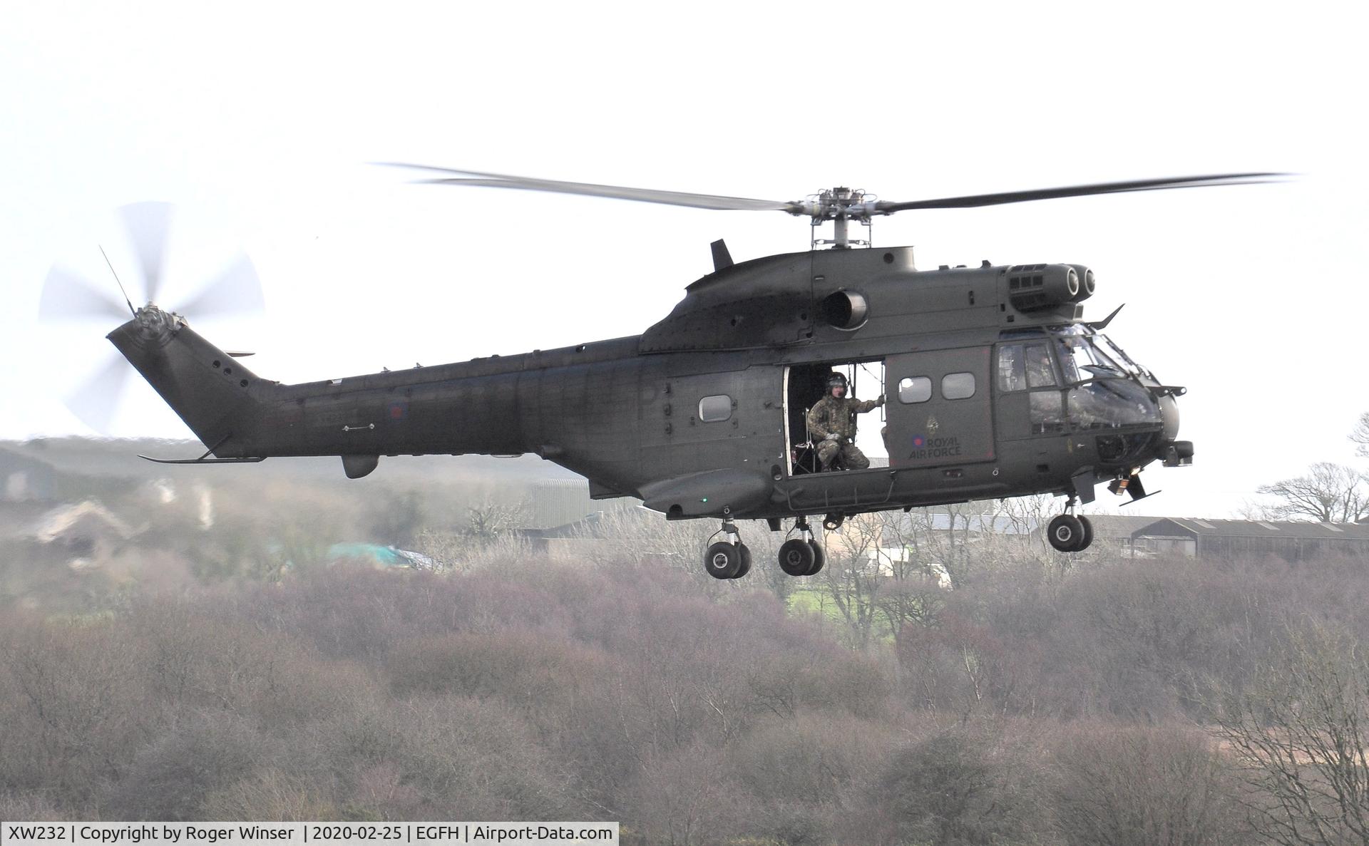 XW232, 1972 Westland Puma HC.2 C/N 1199, Visiting helicopter coded P of 33 Squadron RAF approaching the airport.
