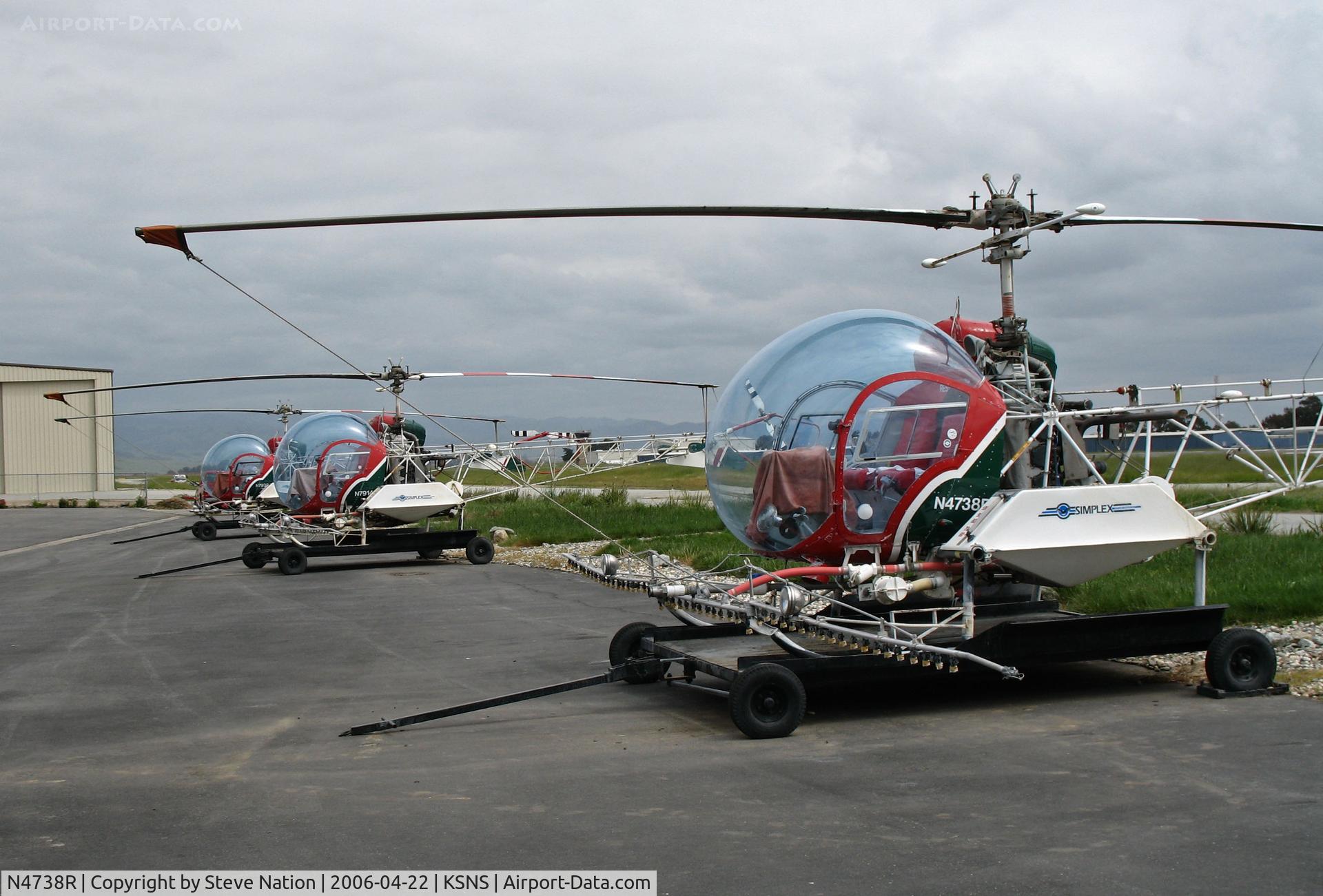 N4738R, 1968 Bell 47G-5 C/N 7914, Gomes Farm Air Service ramp with Bell 47G-5 sprayers N4738R, N7914S and N7938J on trailers