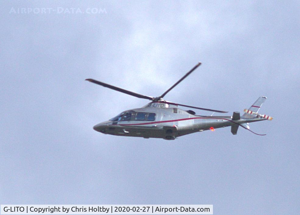 G-LITO, 2006 Agusta A109S Grand C/N 22015, Flypast over Potters Bar, Herts.