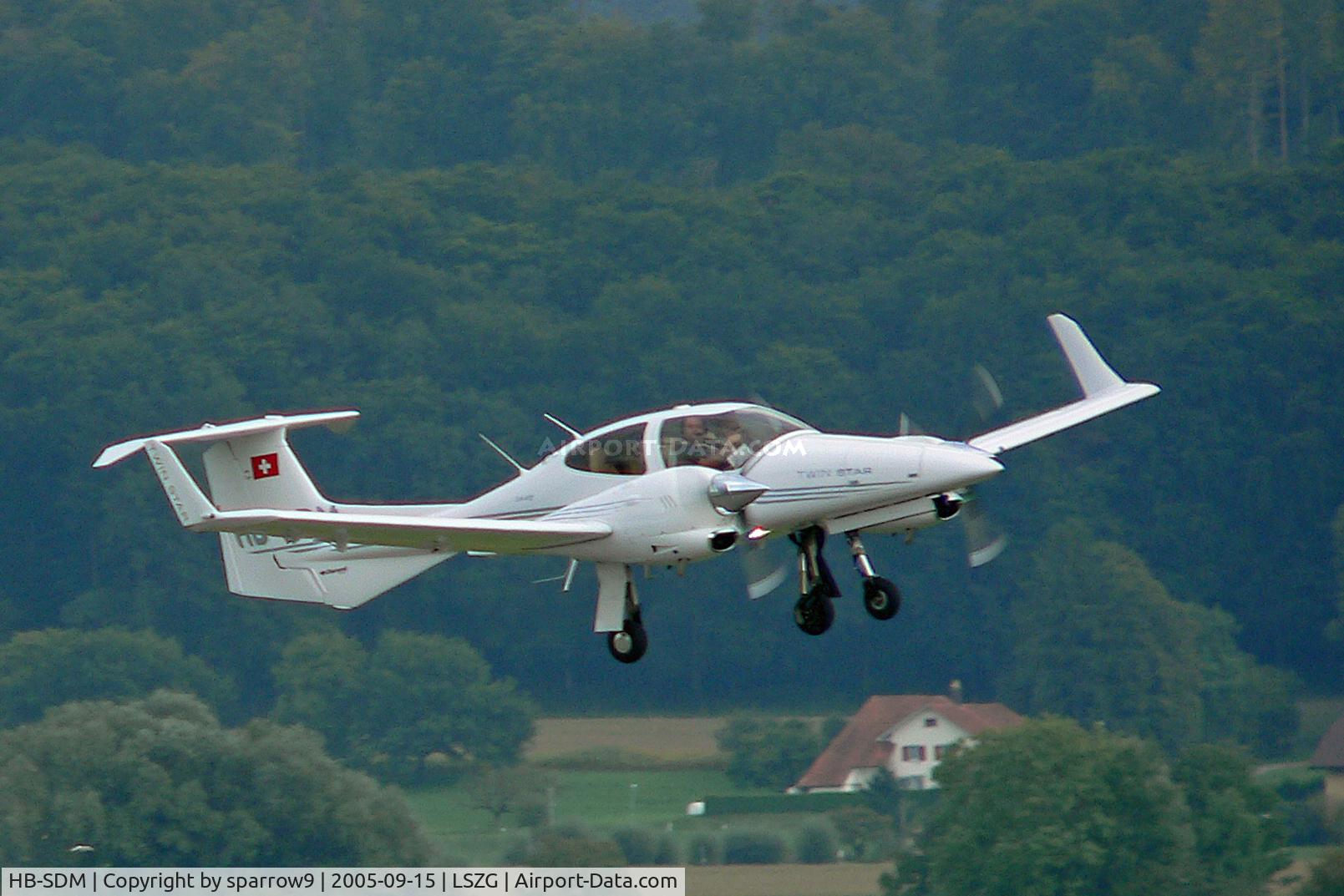 HB-SDM, 2005 Diamond DA-42 Twin Star C/N 42.039, Taking-off Grenchen a month after its HB-registration.