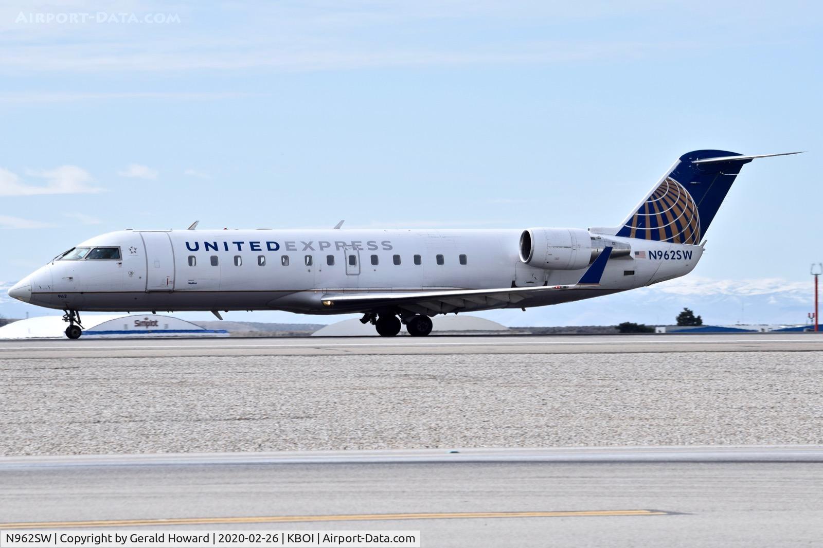 N962SW, 2003 Bombardier CRJ-200ER (CL-600-2B19) C/N 7859, Starting take off run on 10L.