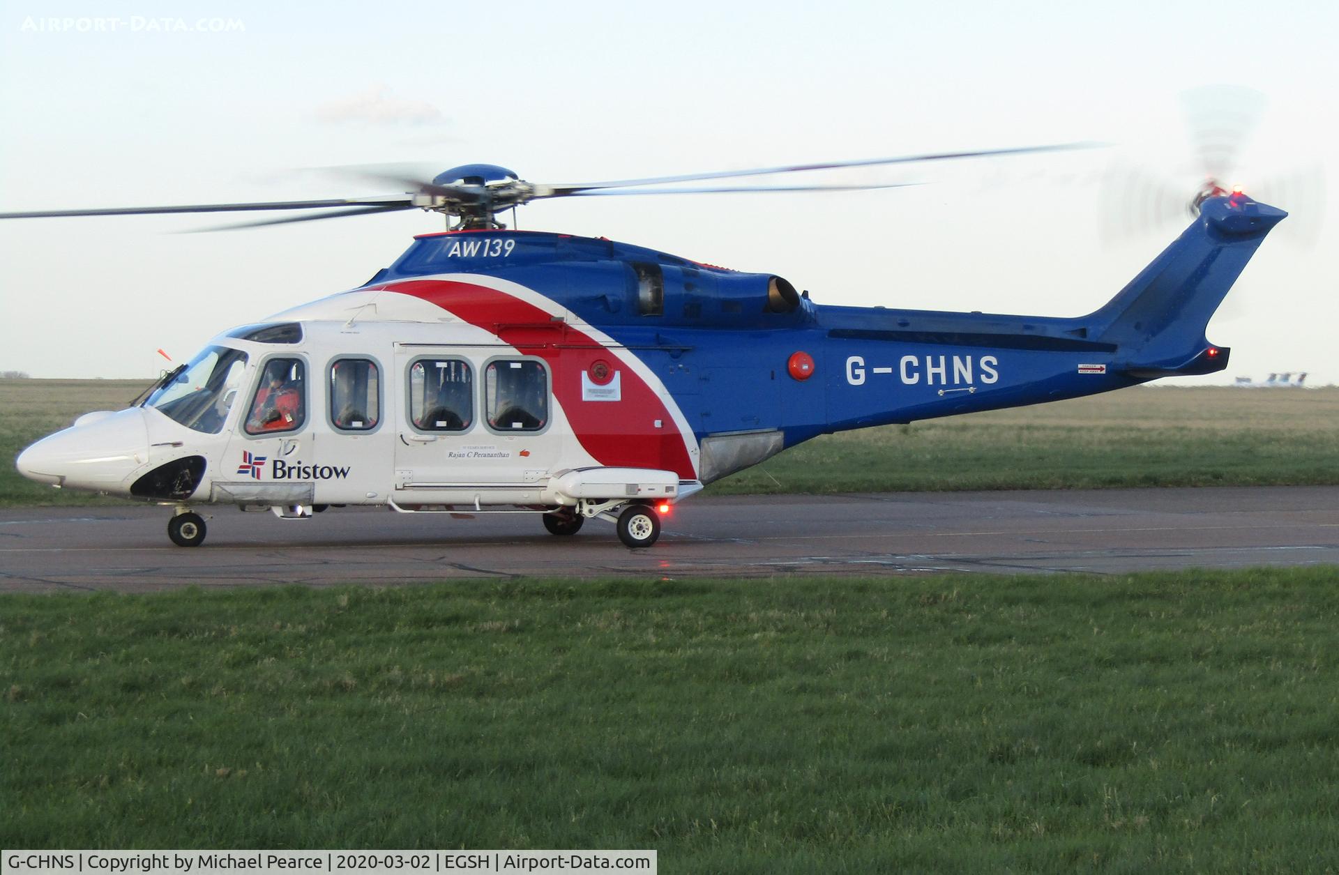 G-CHNS, 2012 AgustaWestland AW-139 C/N 31465, Taxiing to the Western Apron. Now with '35 Years Service: Rajan C Perananthan' sticker.