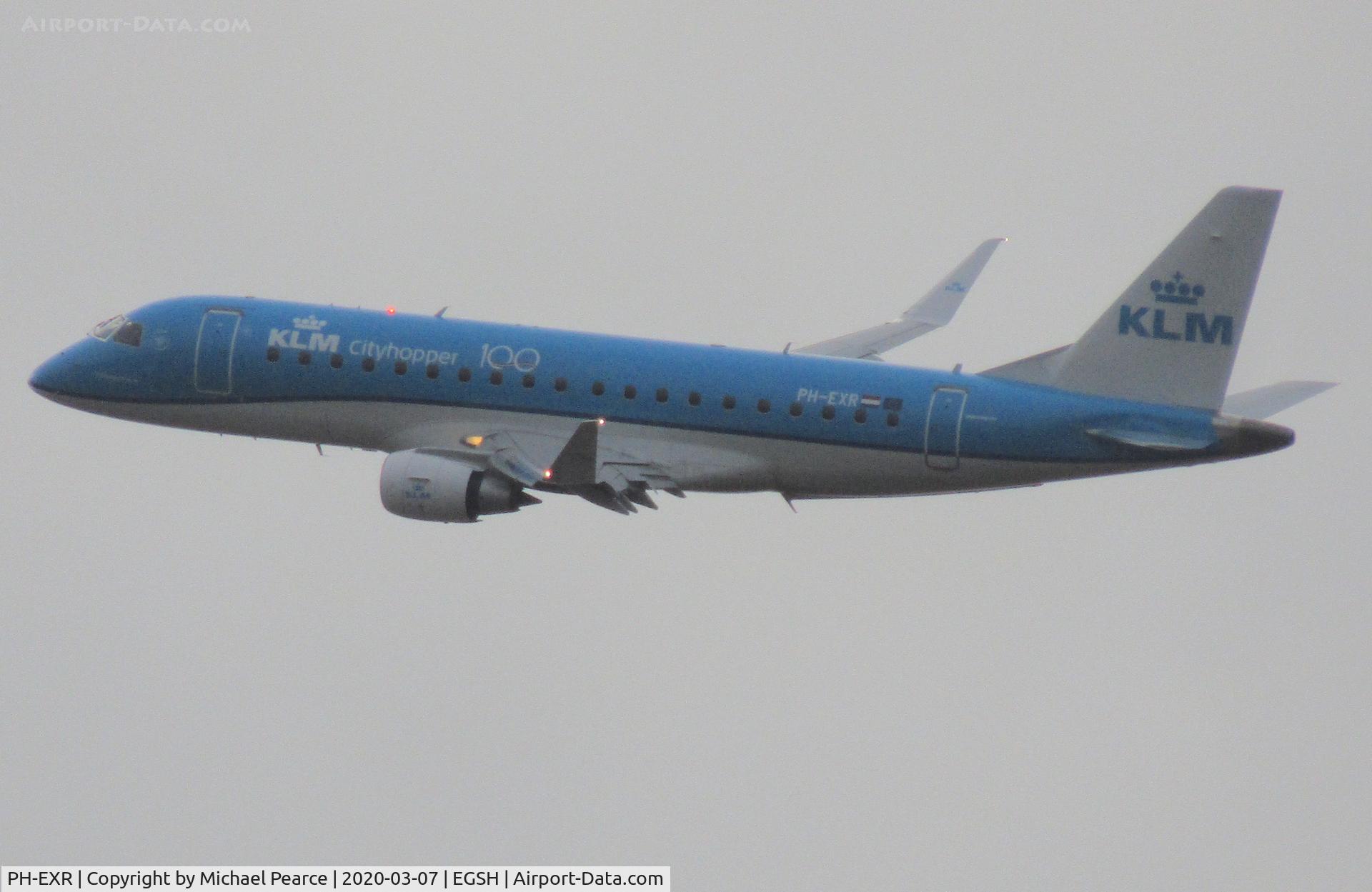 PH-EXR, 2017 Embraer 175STD (ERJ-170-200STD) C/N 17000697, Banking on departure from RWY 27 to Amsterdam (AMS).