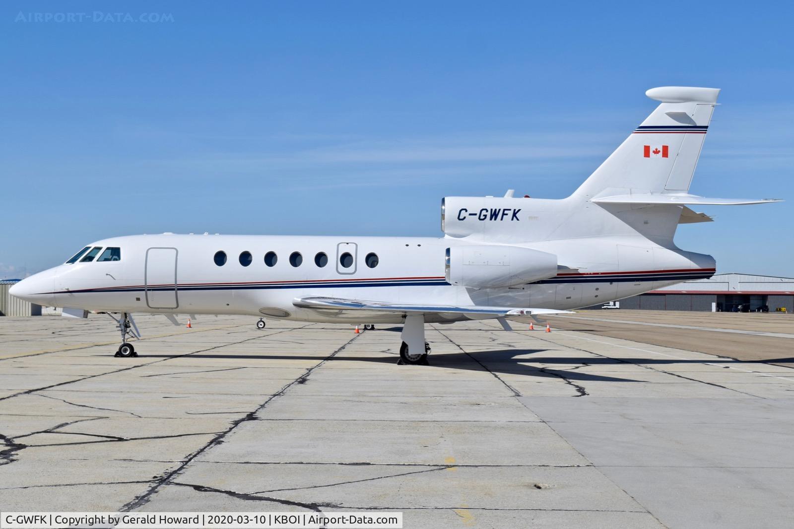 C-GWFK, 1998 Dassault Falcon 50EX C/N 264, Parked on sought GA ramp.