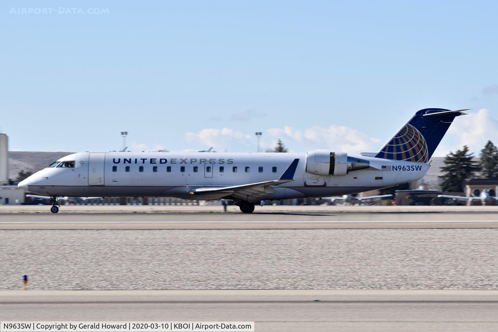 N963SW, 2003 Bombardier CRJ-200LR (CL-600-2B19) C/N 7865, Landing 10L.