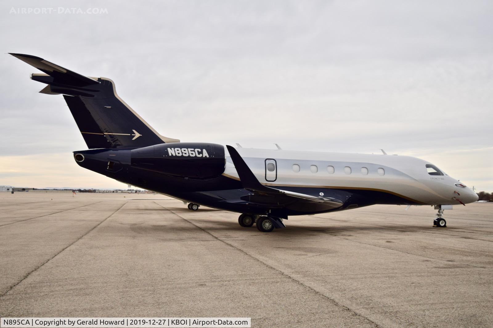 N895CA, 2016 Embraer EMB-550 Legacy 500 C/N 55000042, Parked on south GA ramp.