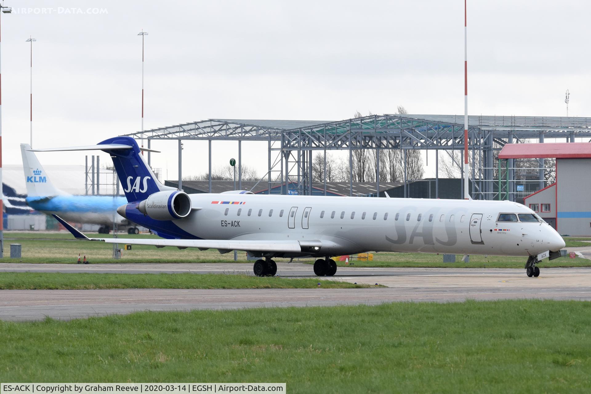 ES-ACK, 2009 Bombardier CRJ-900 (CL-600-2D24) C/N 15211, Departing from Norwich.