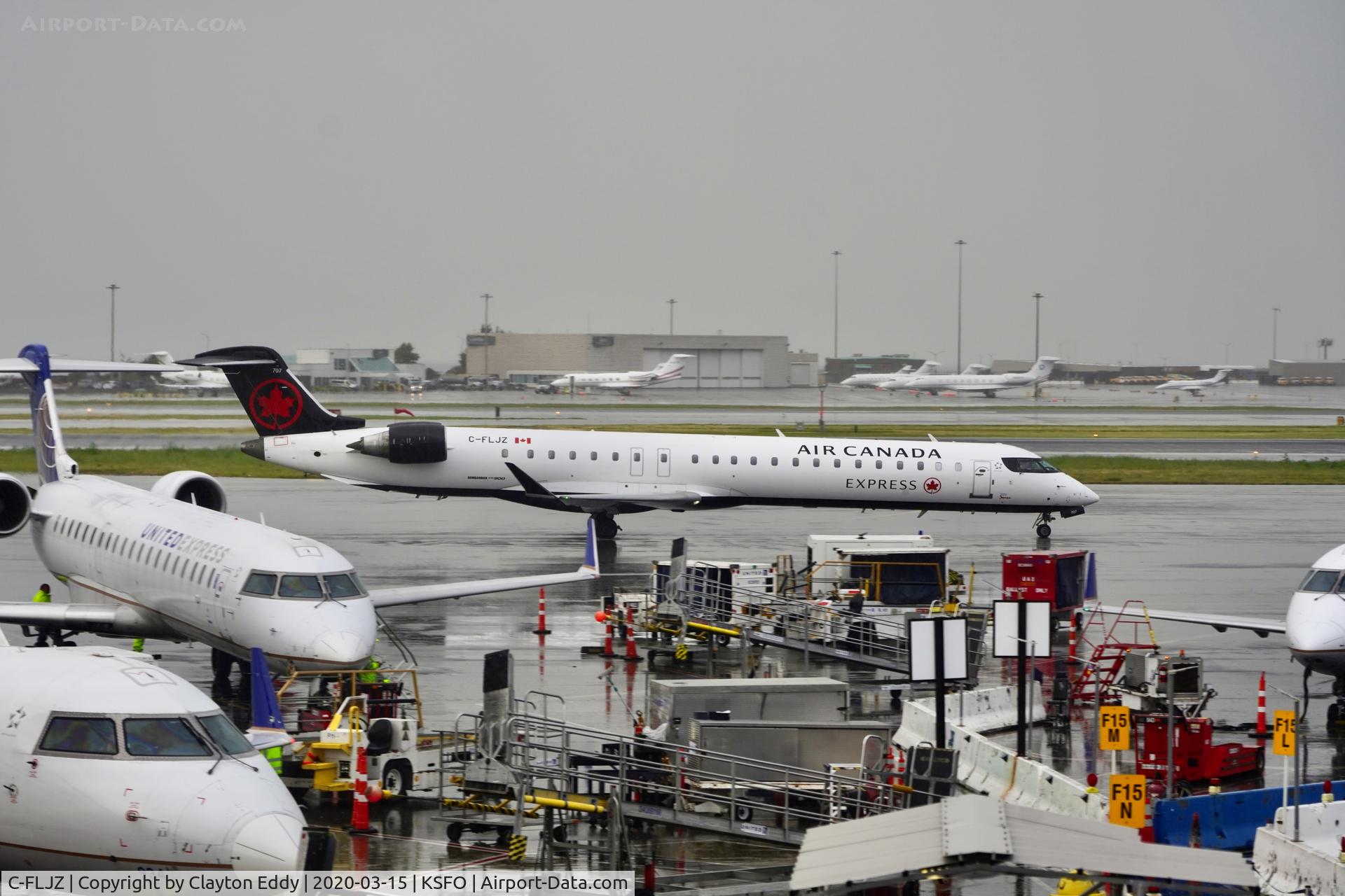 C-FLJZ, 2005 Canadair CRJ-900 (CL-600-2D24) C/N 15045, Rainy morning SFO 2020.