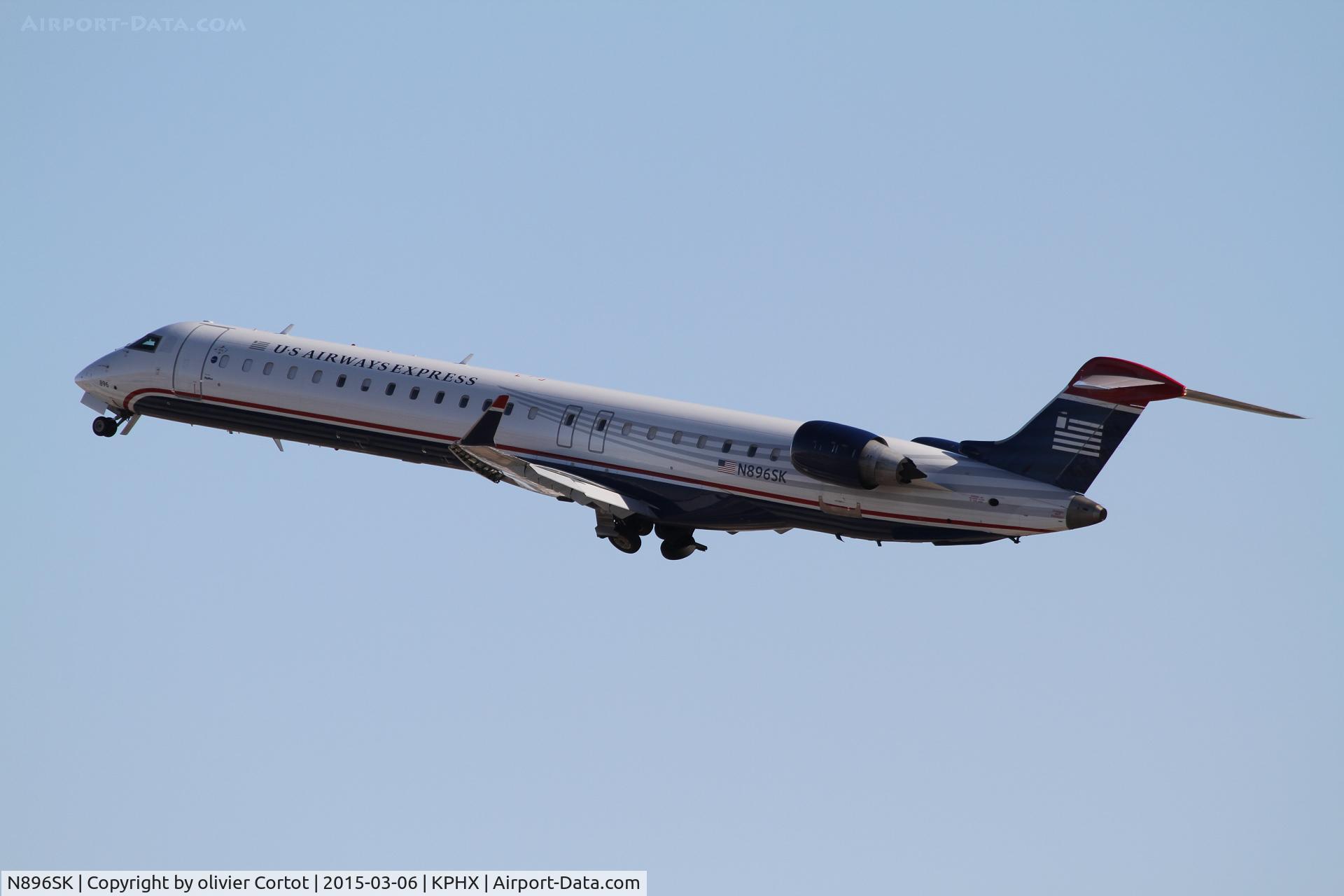 N896SK, 2007 Canadair CRJ-900X (CL-600-2D24) C/N 15102, taking off