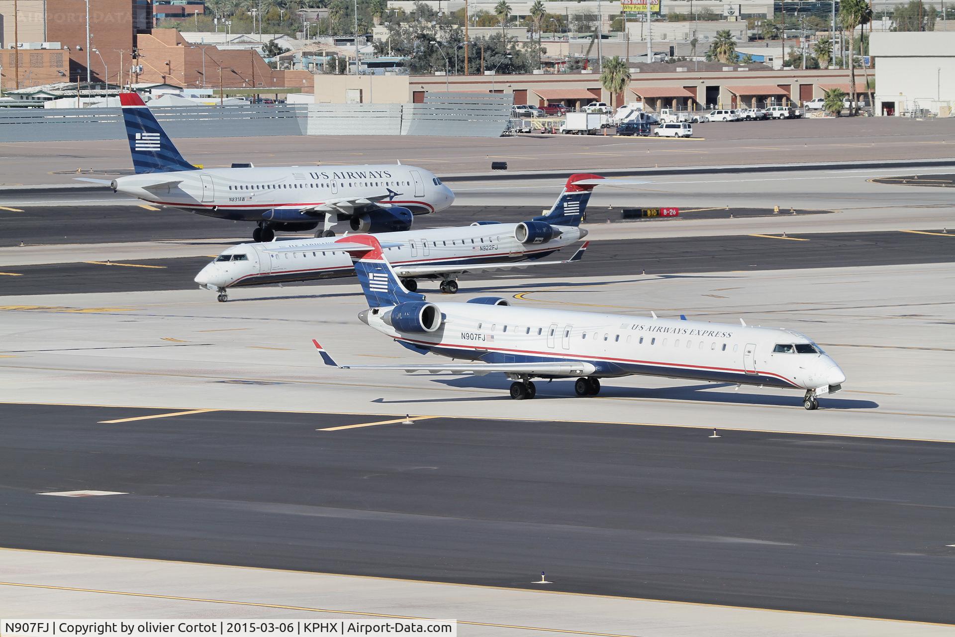 N907FJ, 2003 Bombardier CRJ-900ER (CL-600-2D24) C/N 15007, lot's of US airways birds in Phoenix !