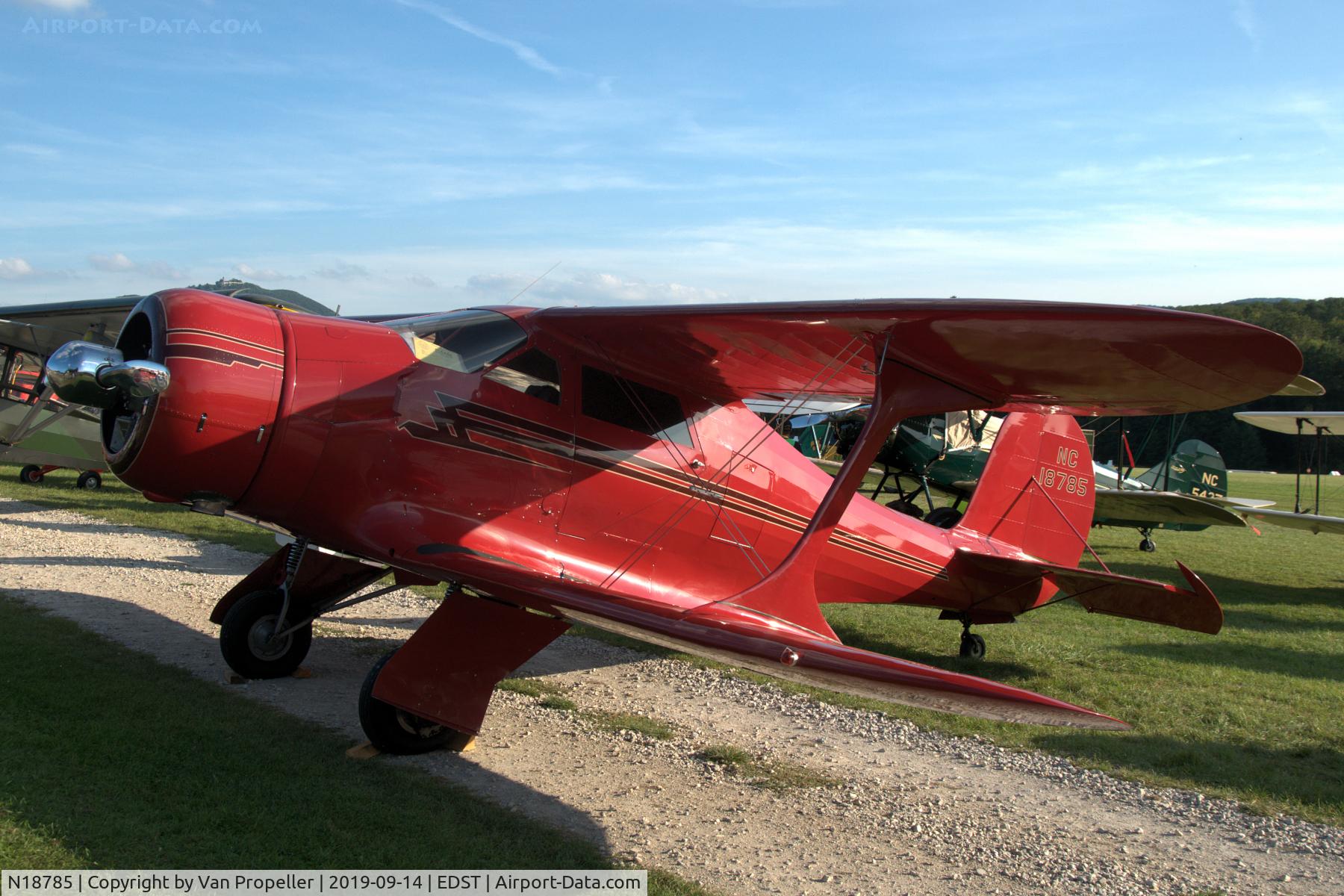 N18785, 1938 Beech E17L C/N 208, Beechcraft E17L Staggerwing on the flightline at Hahnweide airfield, Germany. OTT 2019