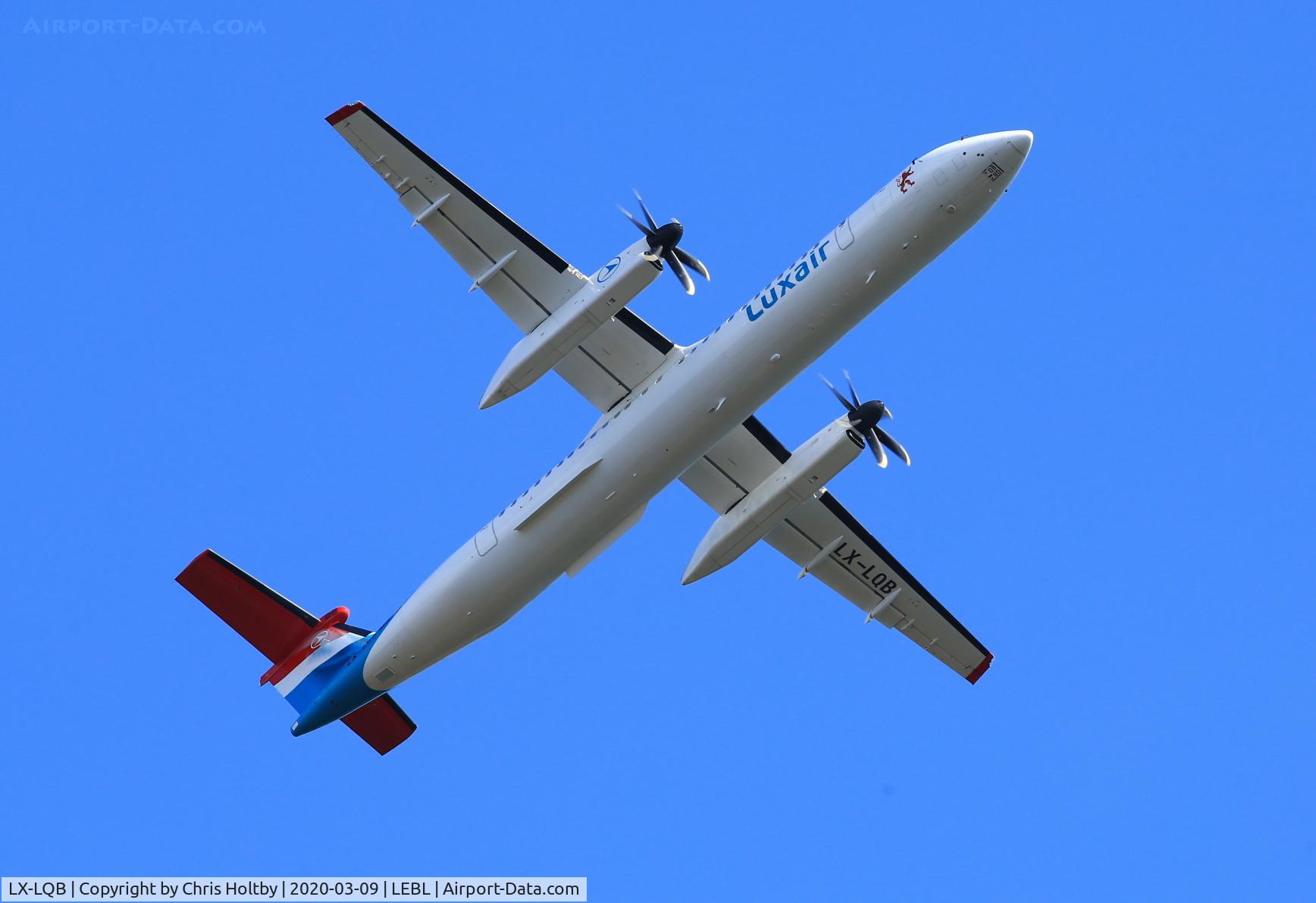 LX-LQB, 2015 De Havilland Canada DHC-8-402Q Dash 8 C/N 4512, Over the Llobregat Delta after take-off from El Prat Airport, Barcelona