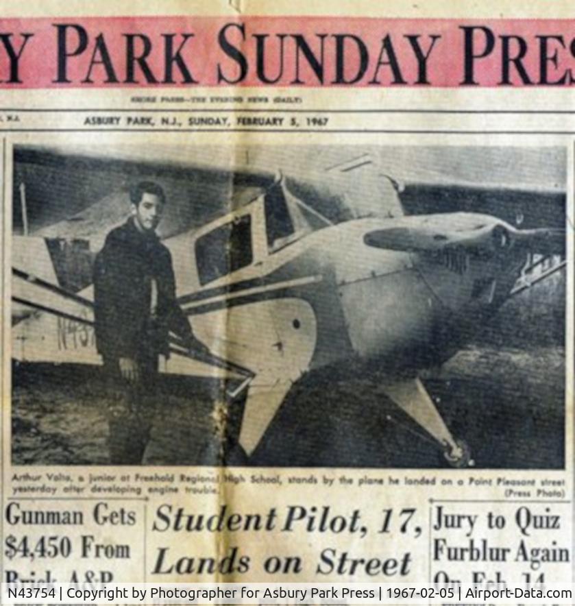 N43754, 1946 Taylorcraft BC12-D C/N 7413, Picture taken by a reporter for the Asbury Park Press, who happened to be driving by just as I touched down with engine trouble on Comanche Avenue in Asbury Park NJ.