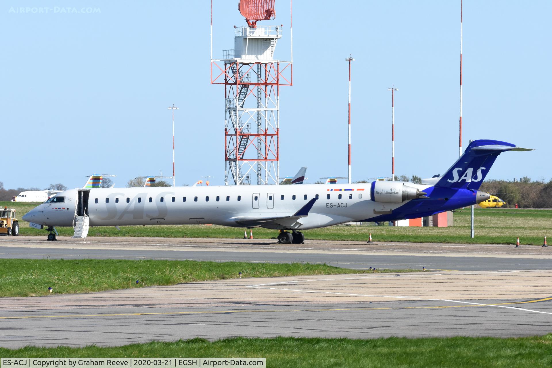 ES-ACJ, 2010 Bombardier CRJ-900LR (CL-600-2D24) C/N 15250, Parked on stand 7 at Norwich.