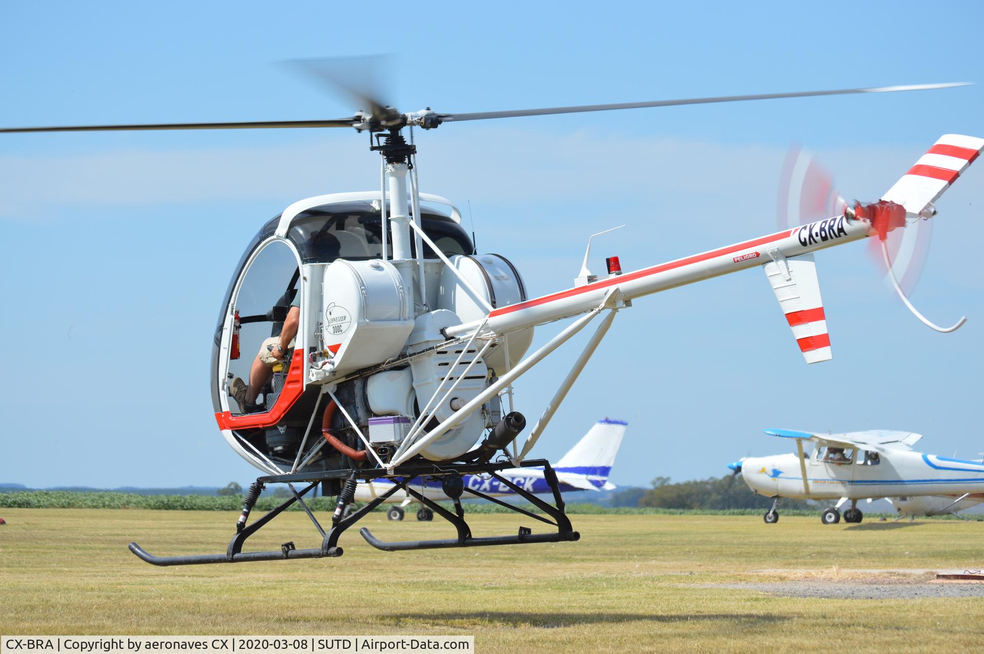 CX-BRA, Schweizer 300C C/N S-1378, en festival aéreo Aero club de flores.