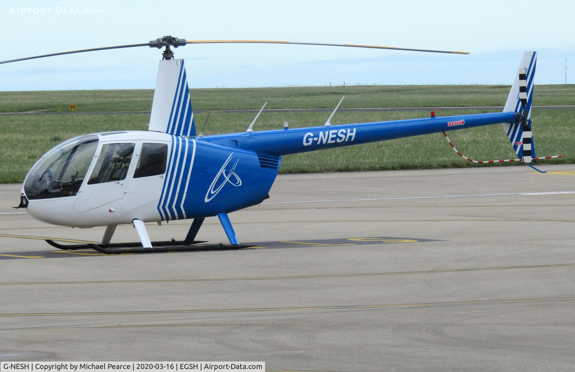 G-NESH, 2007 Robinson R44 Clipper II C/N 11609, Parked on the SaxonAir ramp on a short visit. Now without National Grid titles.
