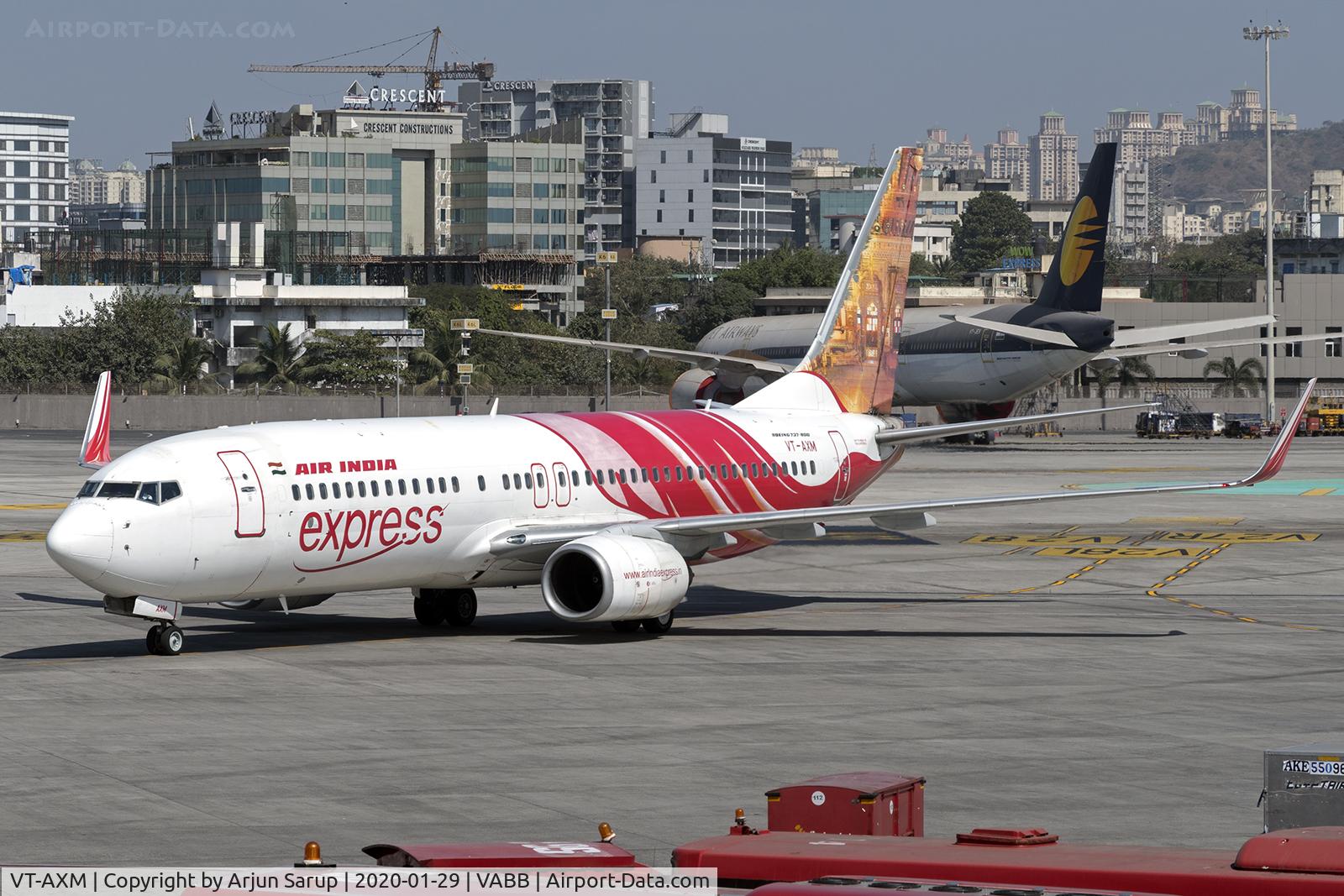 VT-AXM, 2006 Boeing 737-8HG C/N 36326, Taxiing in at CSIA as IX21 from Vijayawada.  Mehrangarh Fort is visible on the colourful tail.