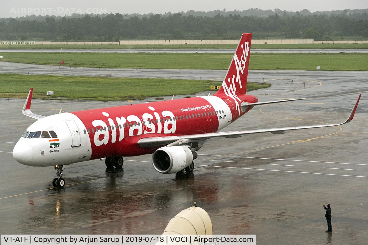 VT-ATF, 2014 Airbus A320-216 C/N 6015, Taxiing in to the gate in a downpour at Cochin International Airport.
