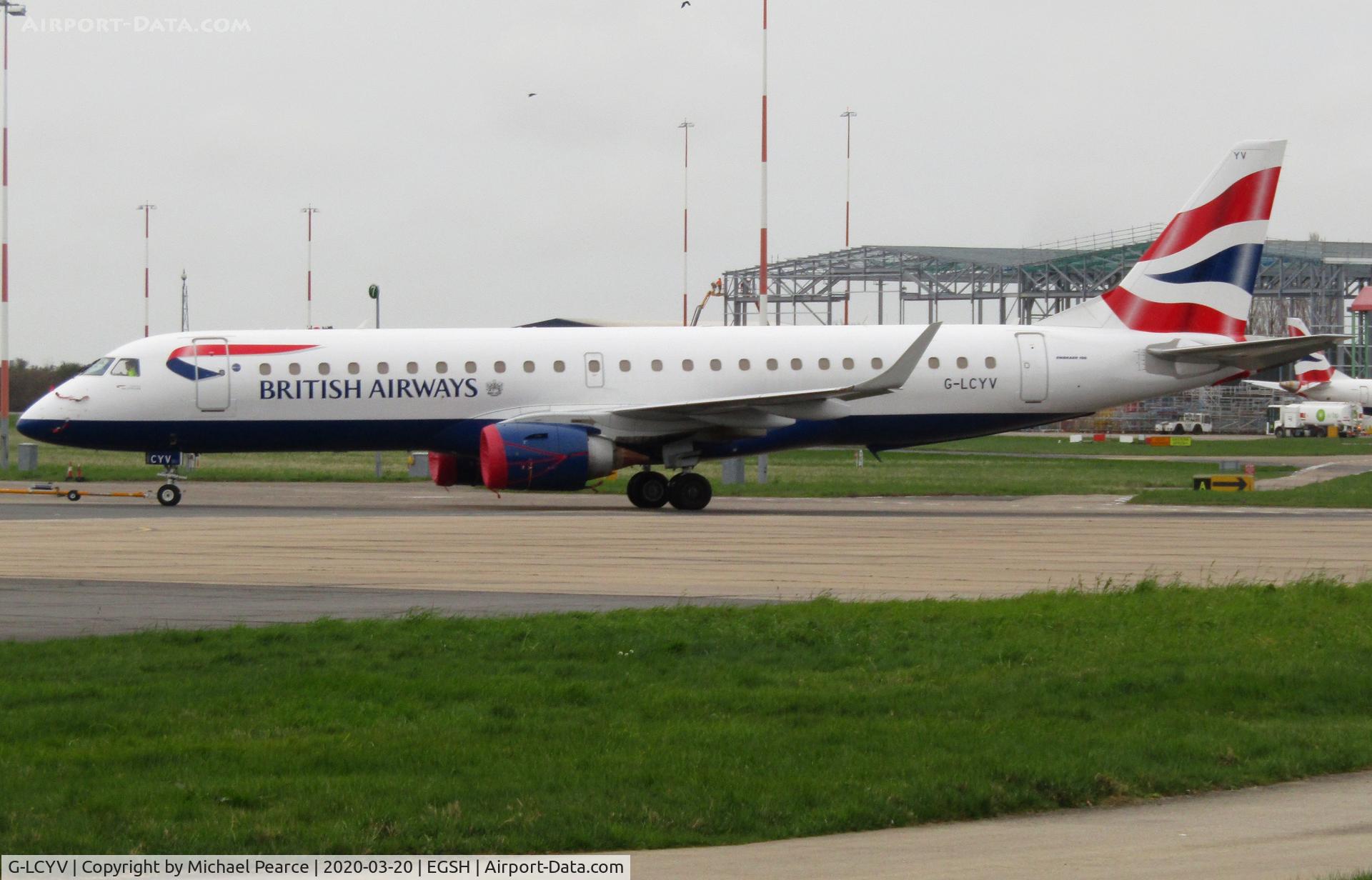 G-LCYV, 2009 Embraer 190AR (ERJ-190-100IGW) C/N 19000255, Under tow to the North Side for storage, due to a drop in passenger demand during the COVID-19 outbreak.