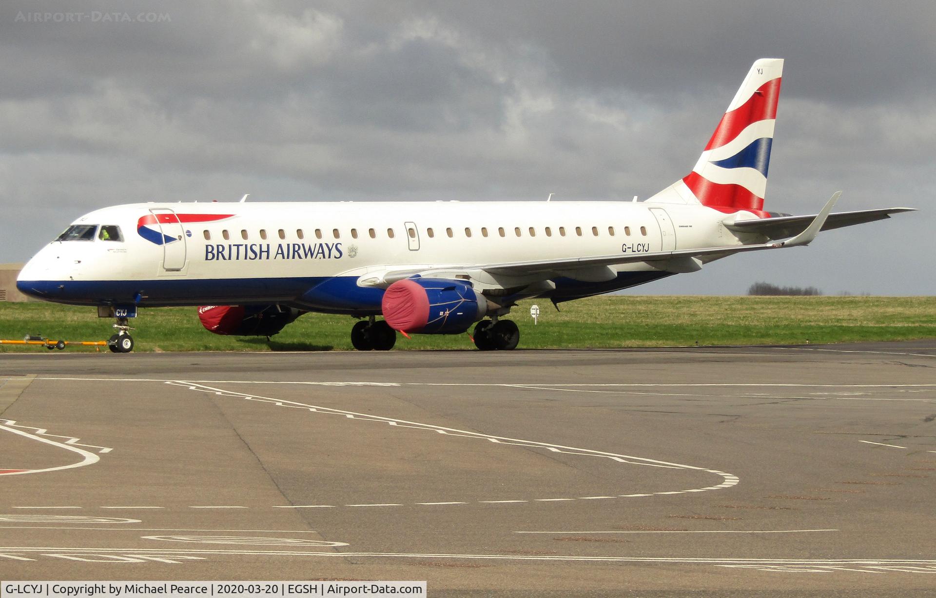 G-LCYJ, 2010 Embraer 190SR (ERJ-190-100SR) C/N 19000339, Under tow to the North Side for storage, due to a drop in passenger demand during the COVID-19 outbreak.